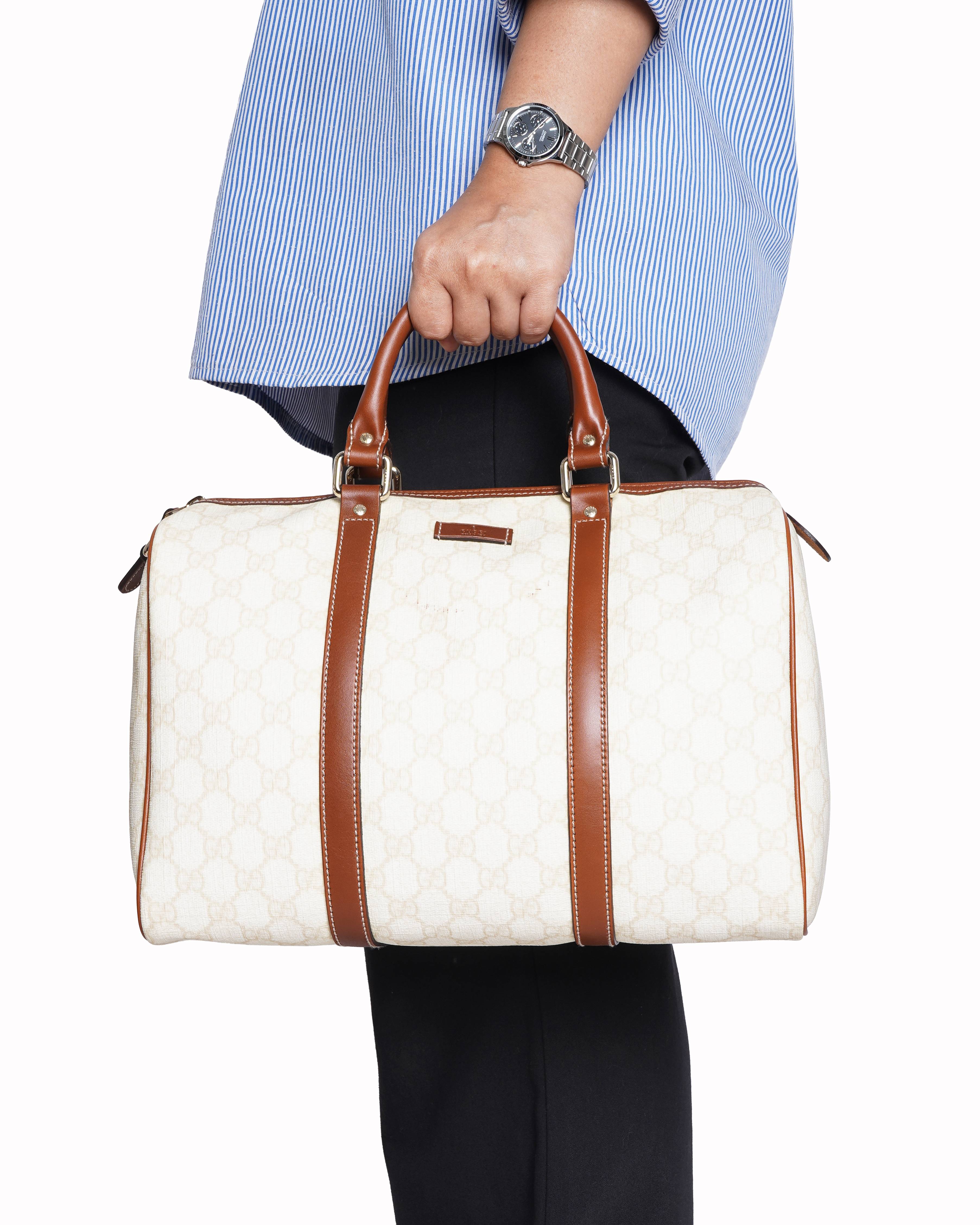 Gucci 
Soho Boston leather handbag