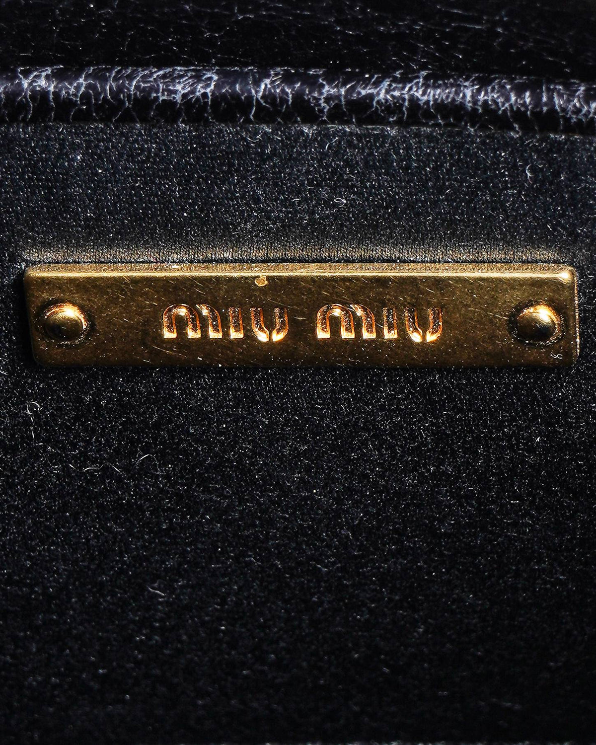 Miu Miu Quilted Mini Shoulder Bag In Black