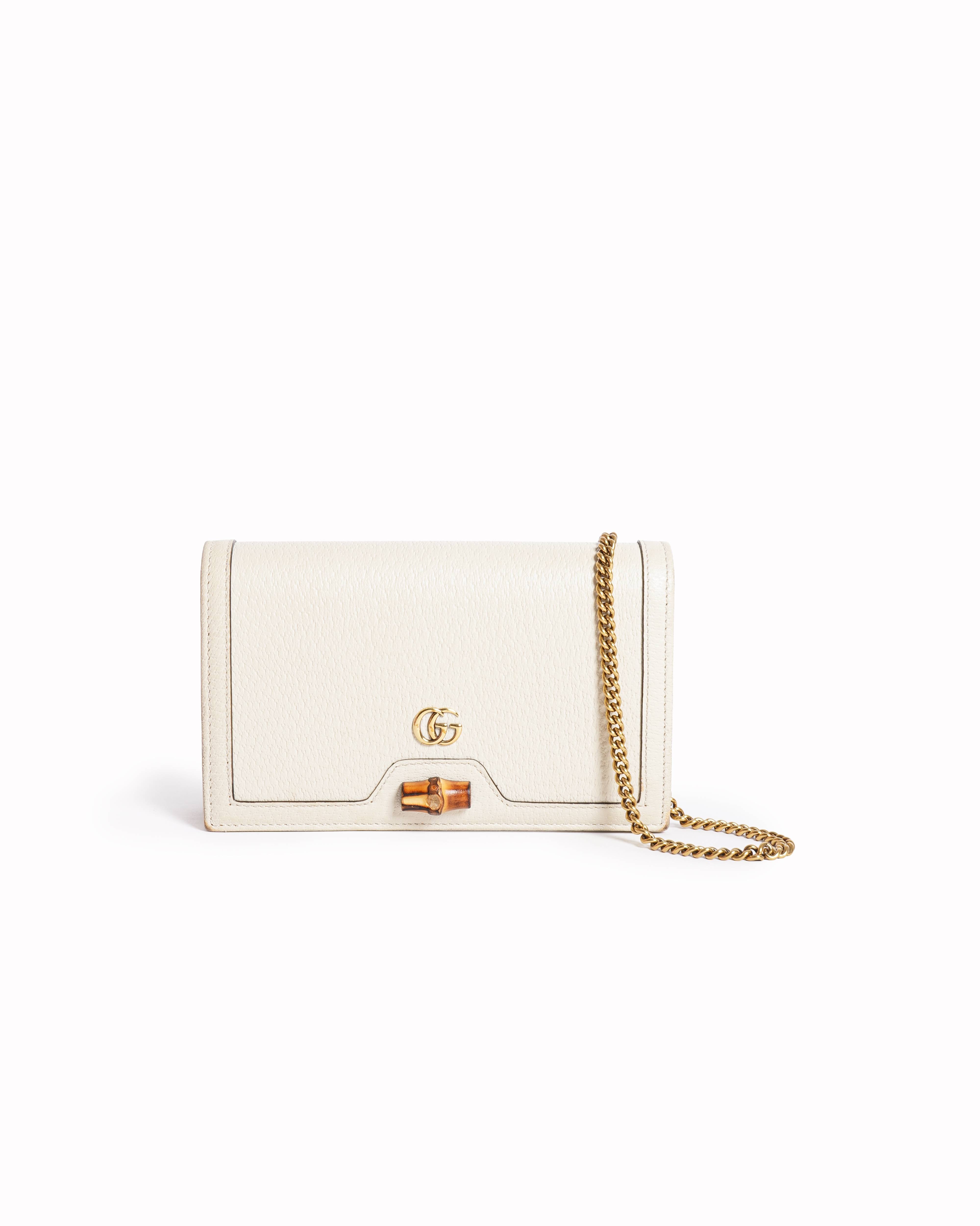 Gucci 
Diana Mini bag with bamboo crossbody bag