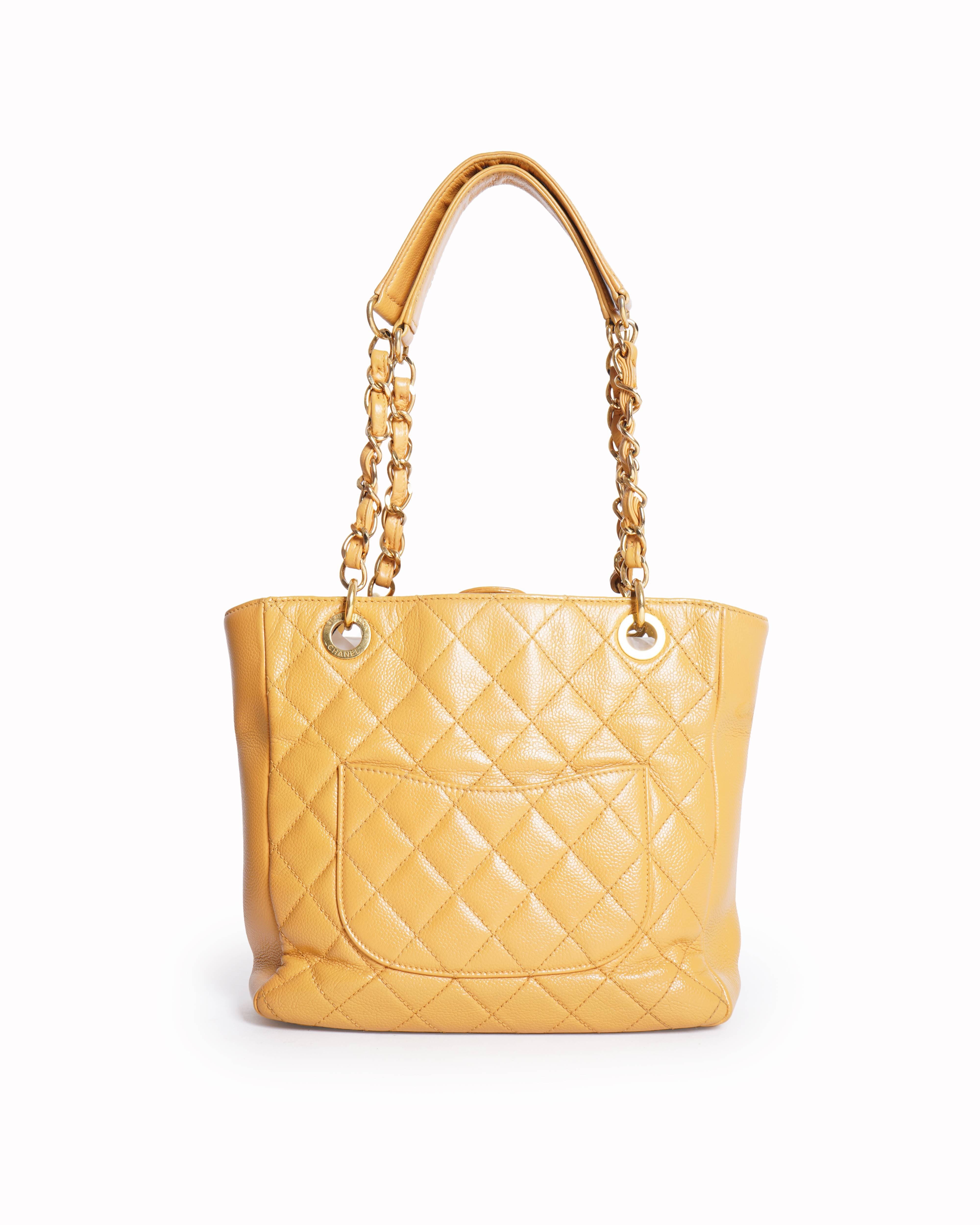 Chanel small petit shopping tote in caviar leather