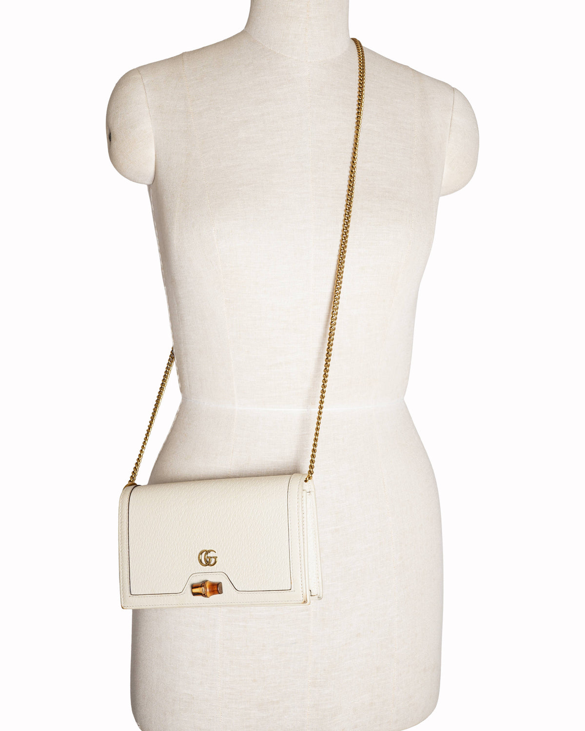 Gucci 
Diana Mini bag with bamboo crossbody bag