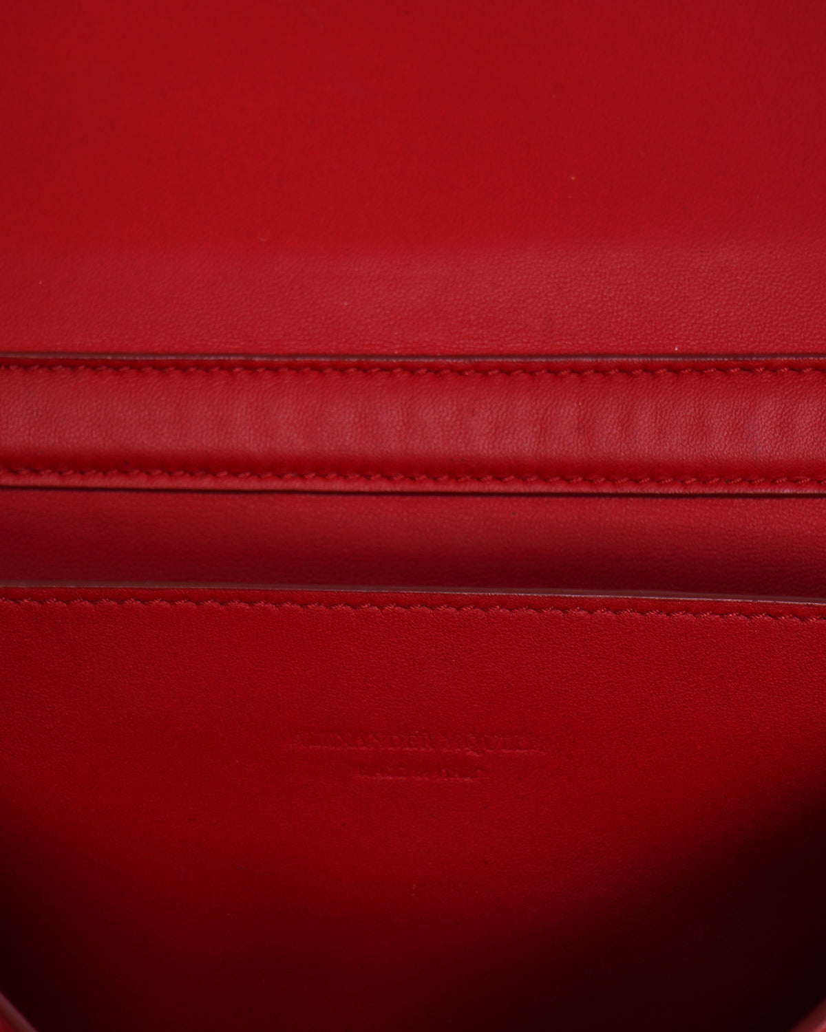 Alexander McQueen red snakeskin logo crossbody bag