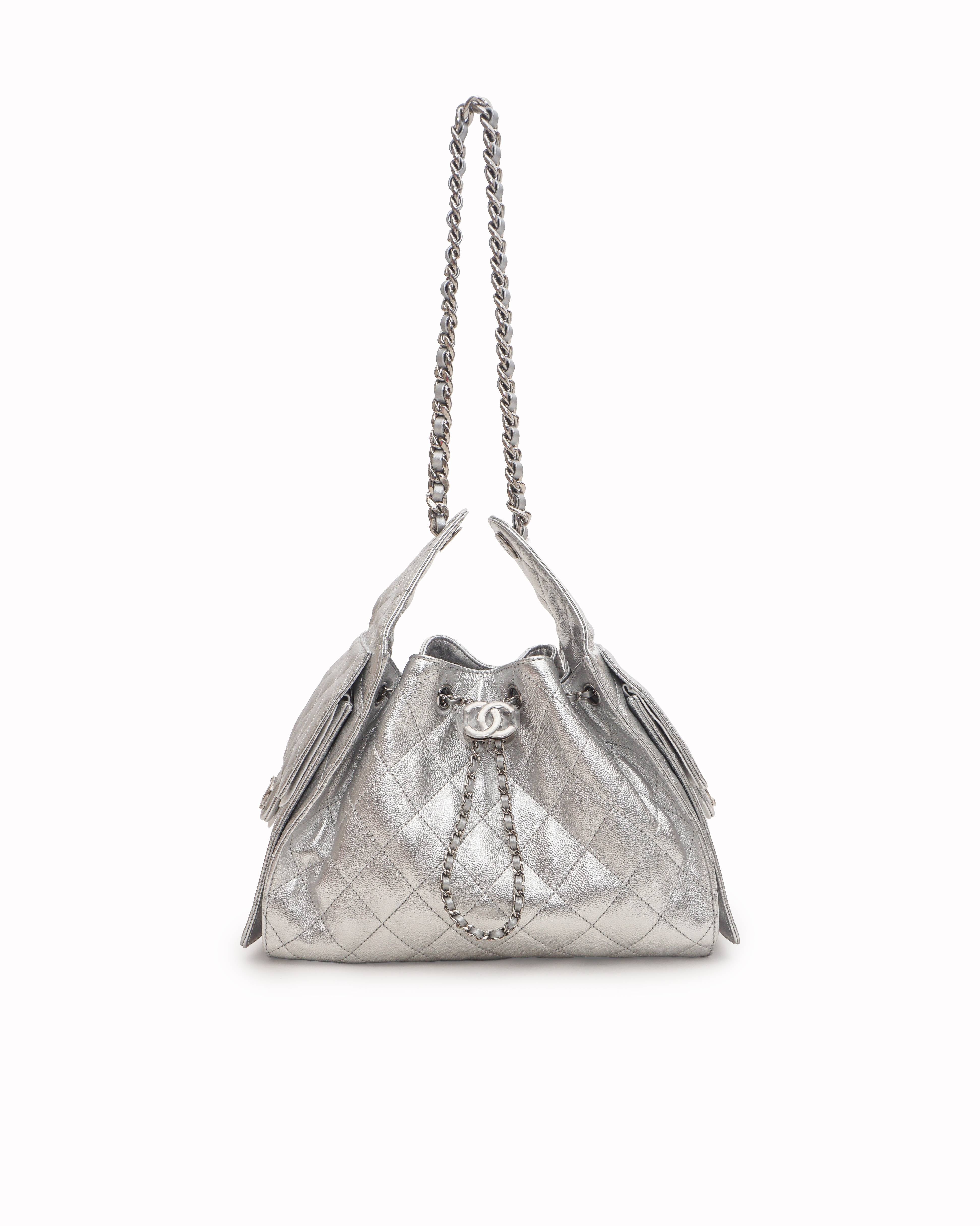 Chanel Metallic Silver Caviar Quilted Mini 25 Drawstring Bag
