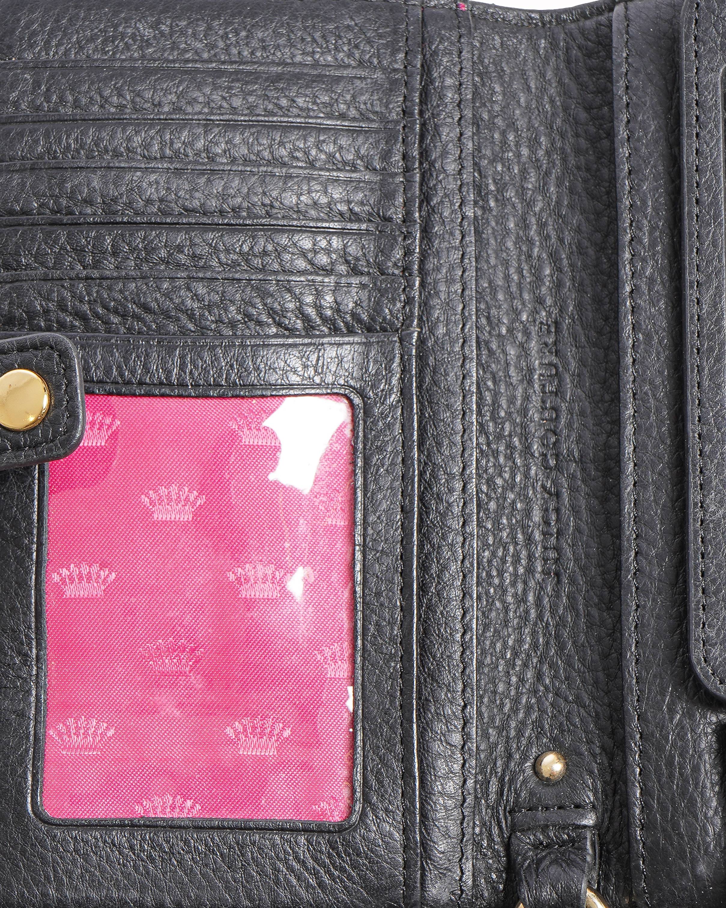 Juicy Couture
mobile wallet card case with a leopard print