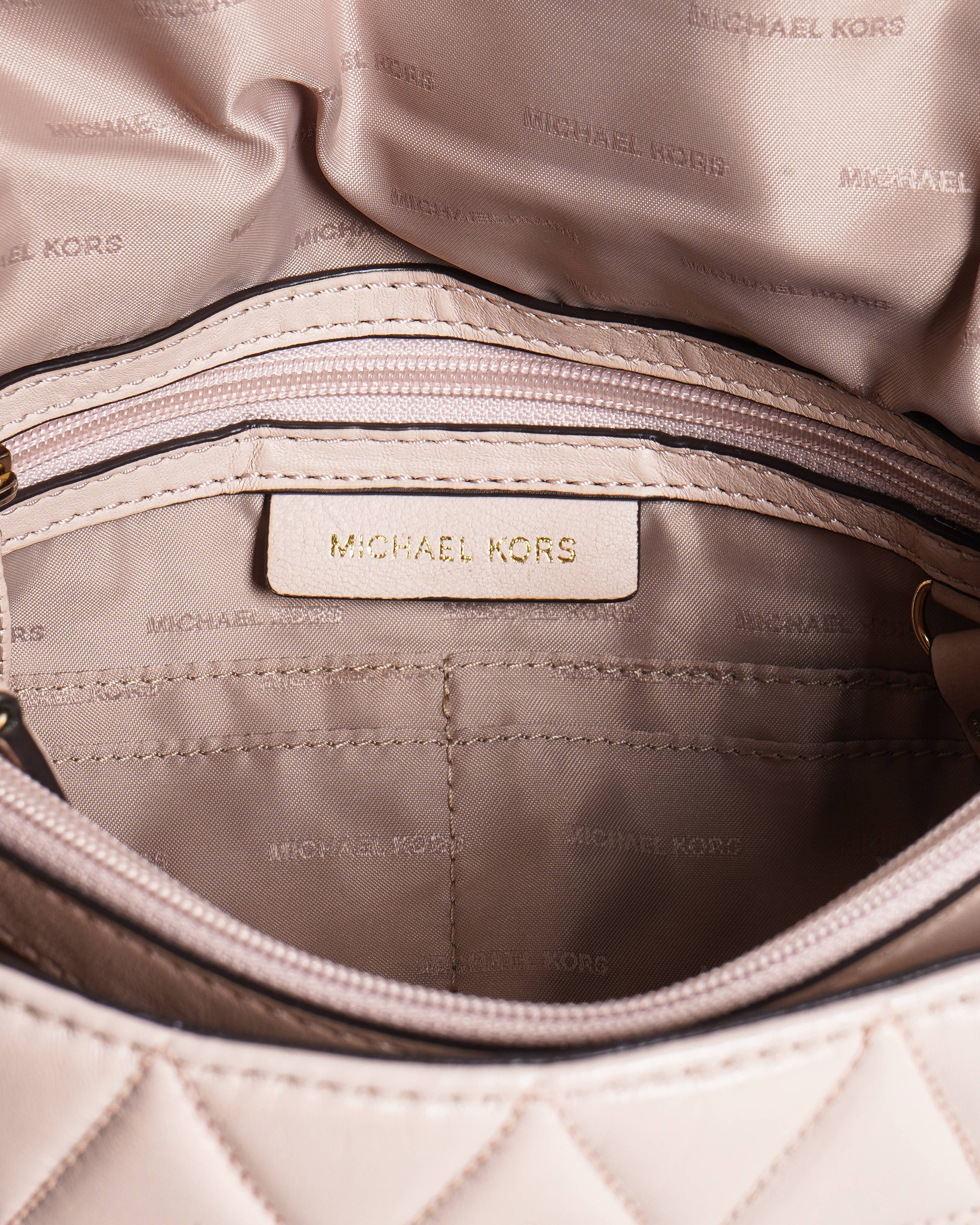 Michael Kors pink quilted shoulder bag