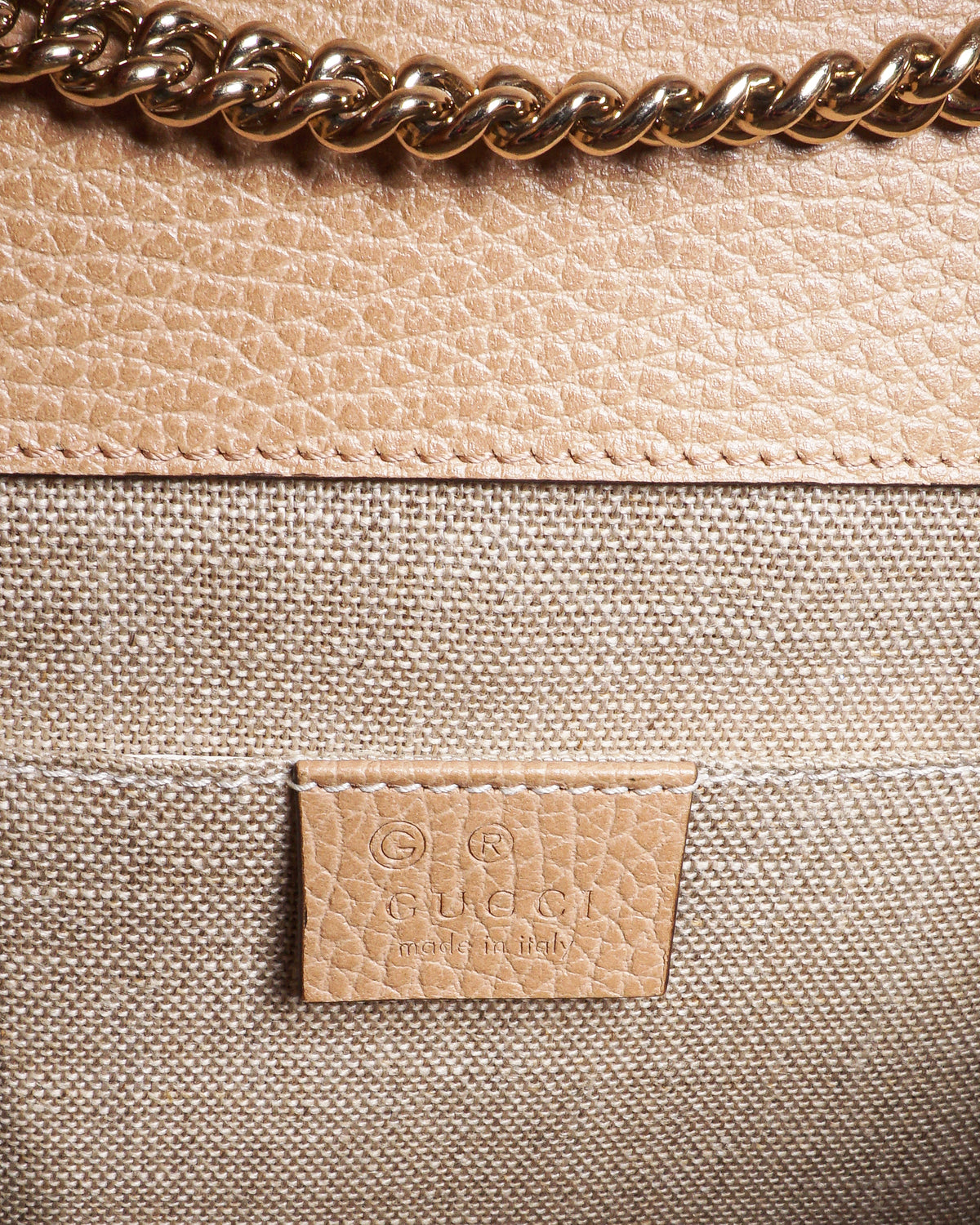 Gucci Small Interlocking G Flap Crossbody Bag in Beige