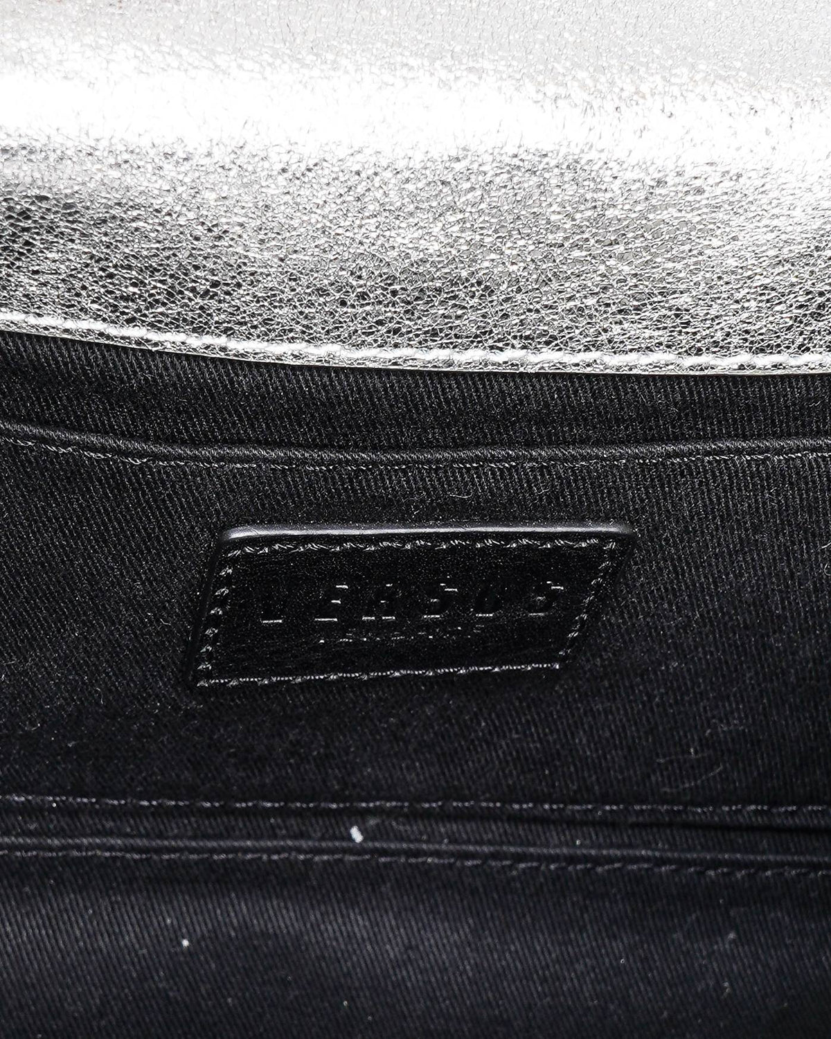 Versace Versus Women's Silver Leather Lion Head Pattern Leather Crossbody Bag