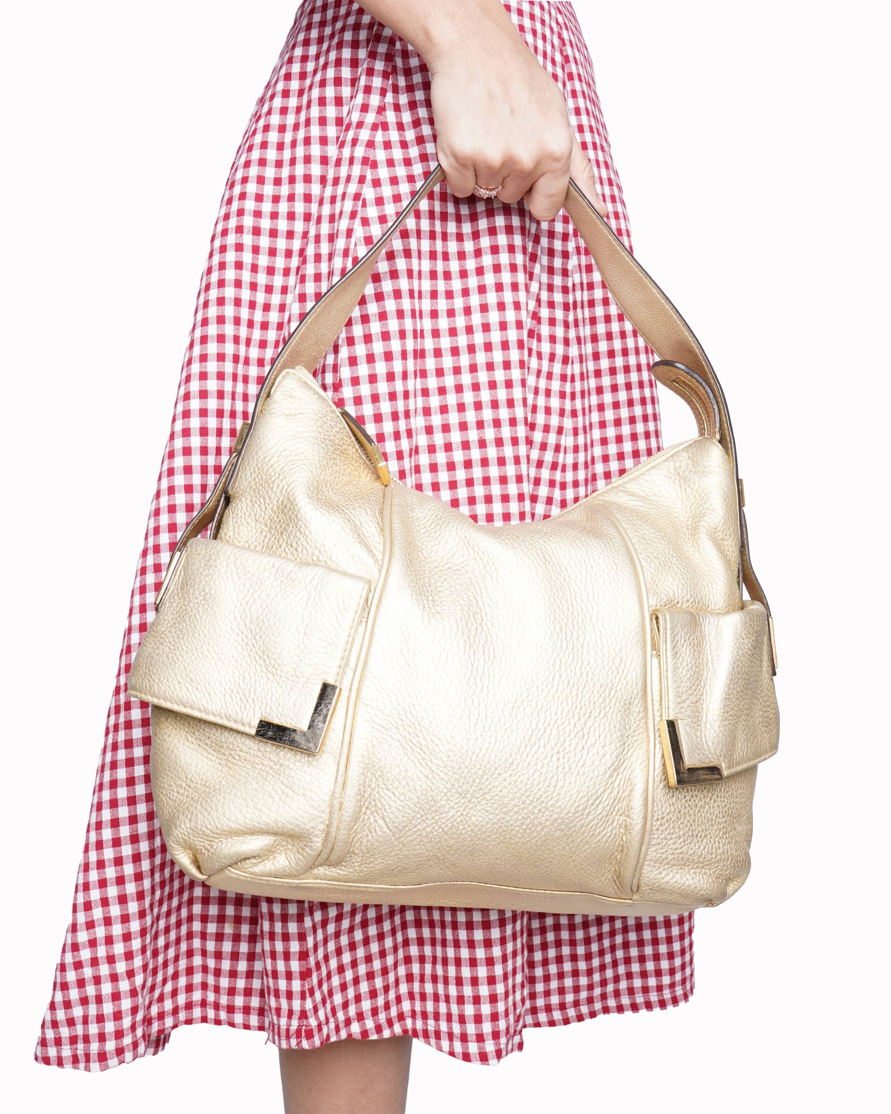 Michael kors golden handbag