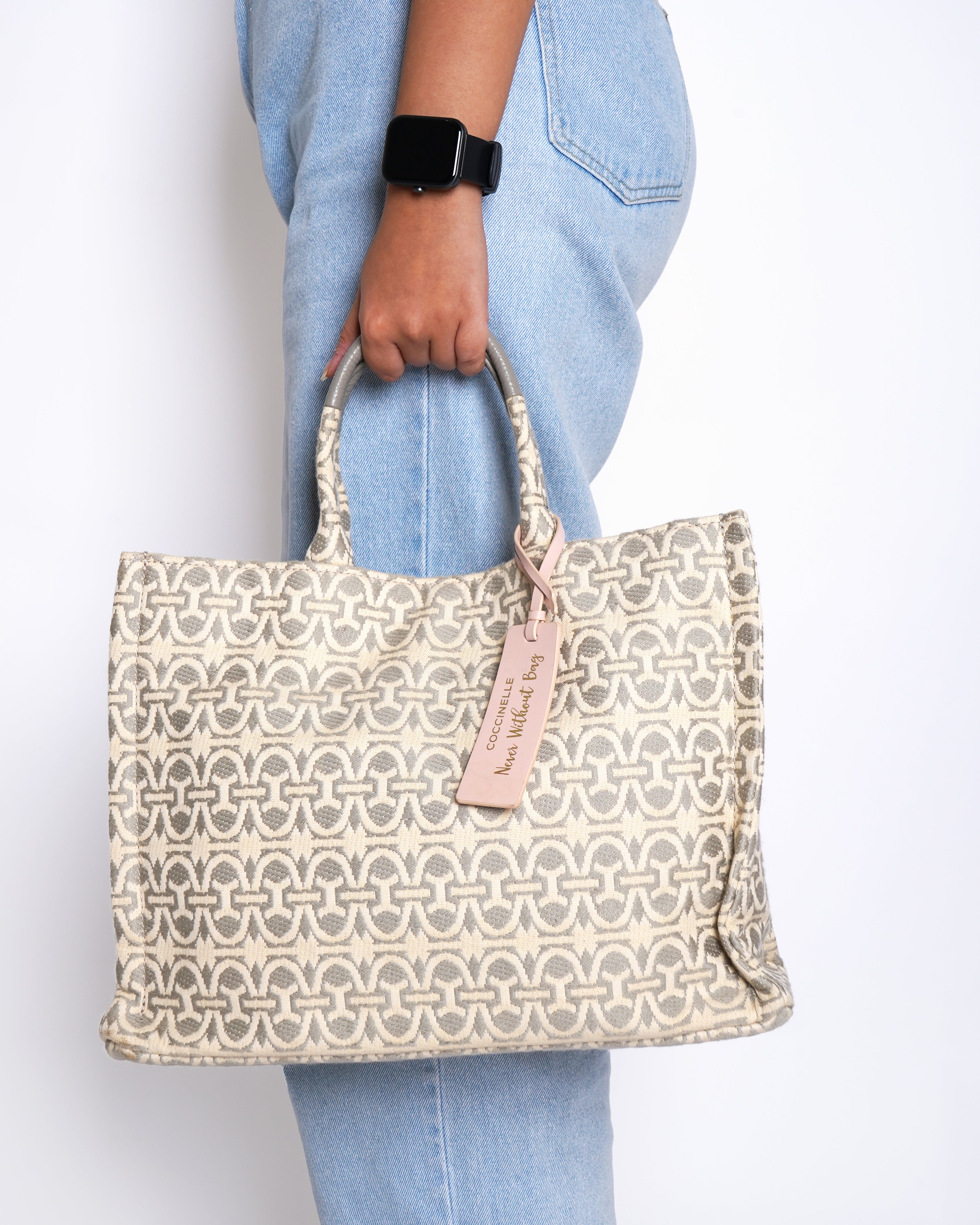 Coccinelle never without tote bag