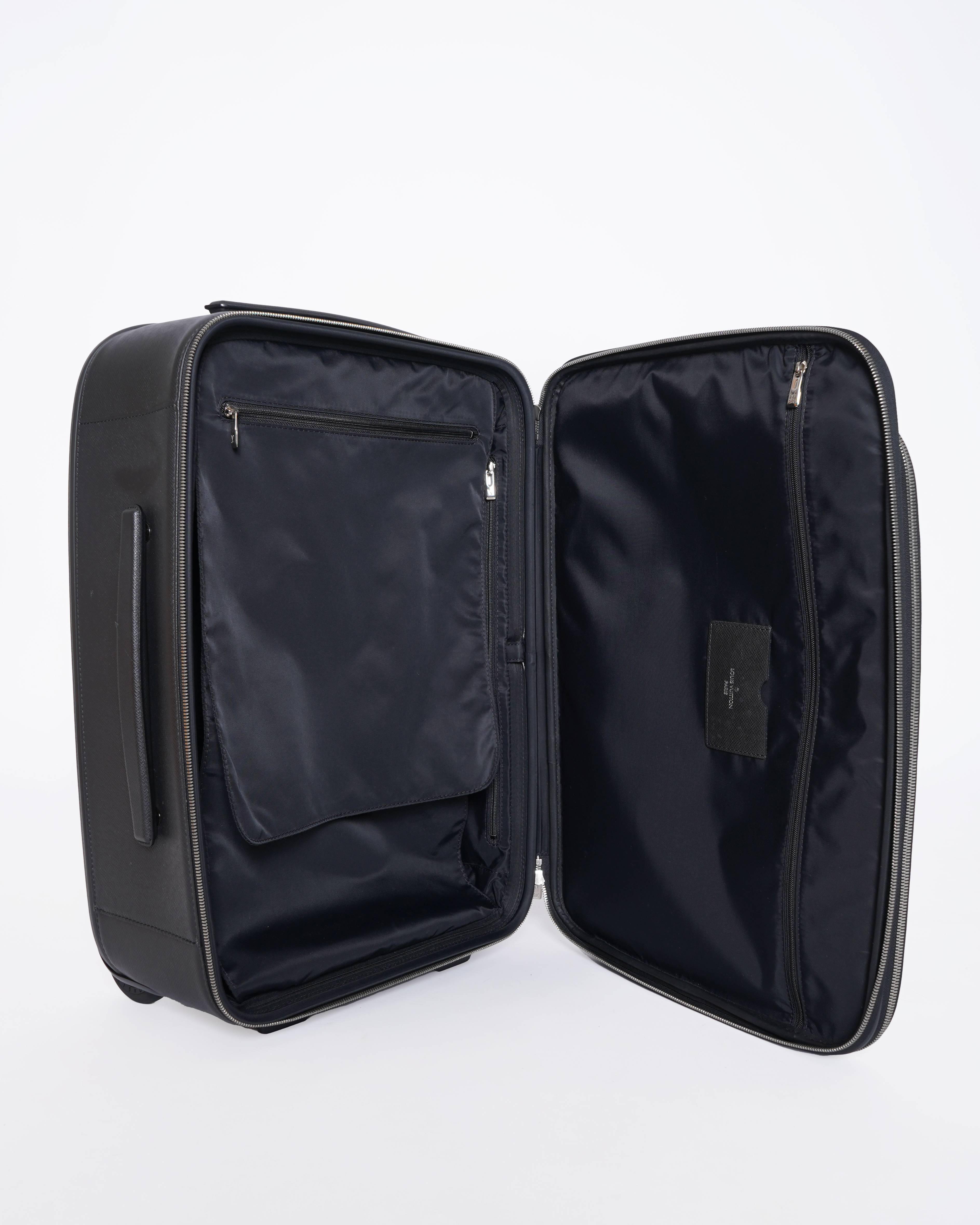 Louis Vuitton leather rolling travel bag