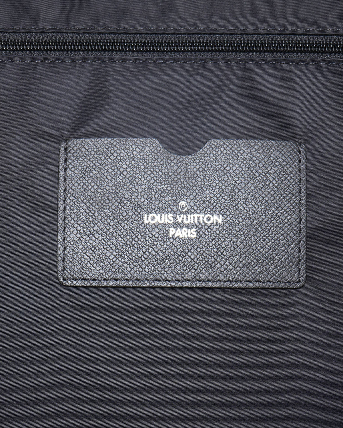 Louis Vuitton leather rolling travel bag