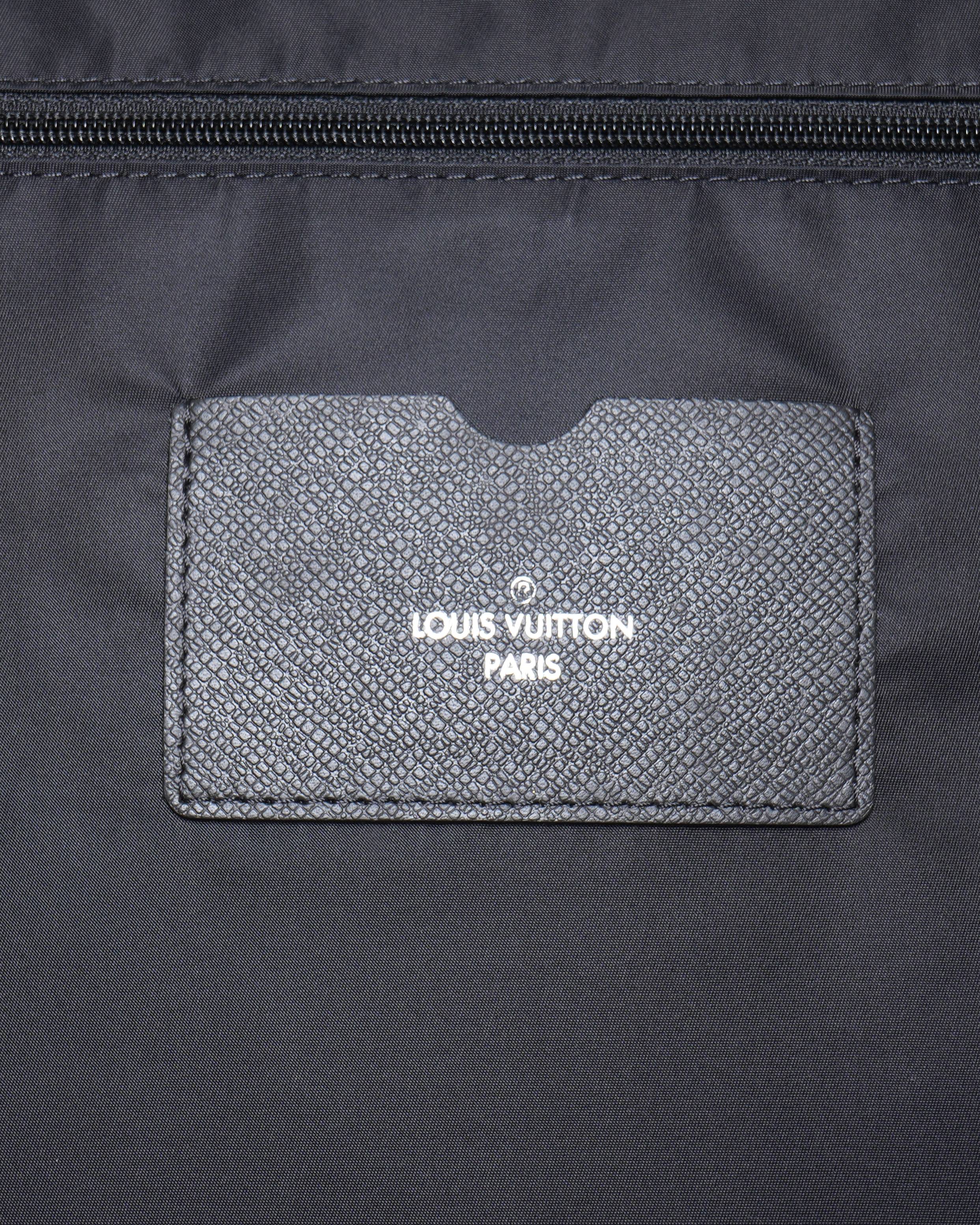 Louis Vuitton leather rolling travel bag