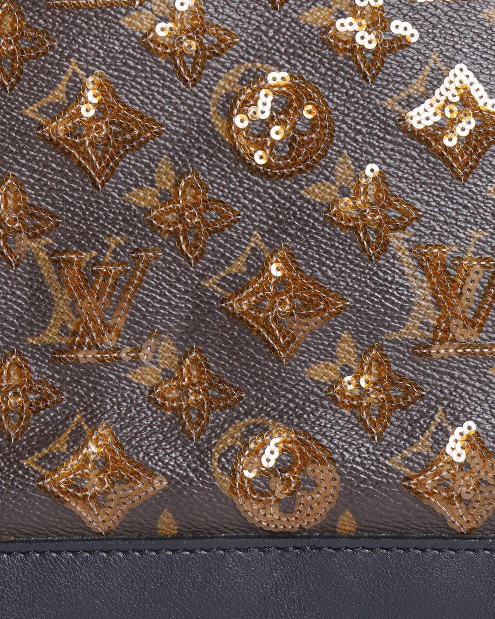 Louis Vuitton
Limited Edition Amber Monogram Eclipse Alma Bag