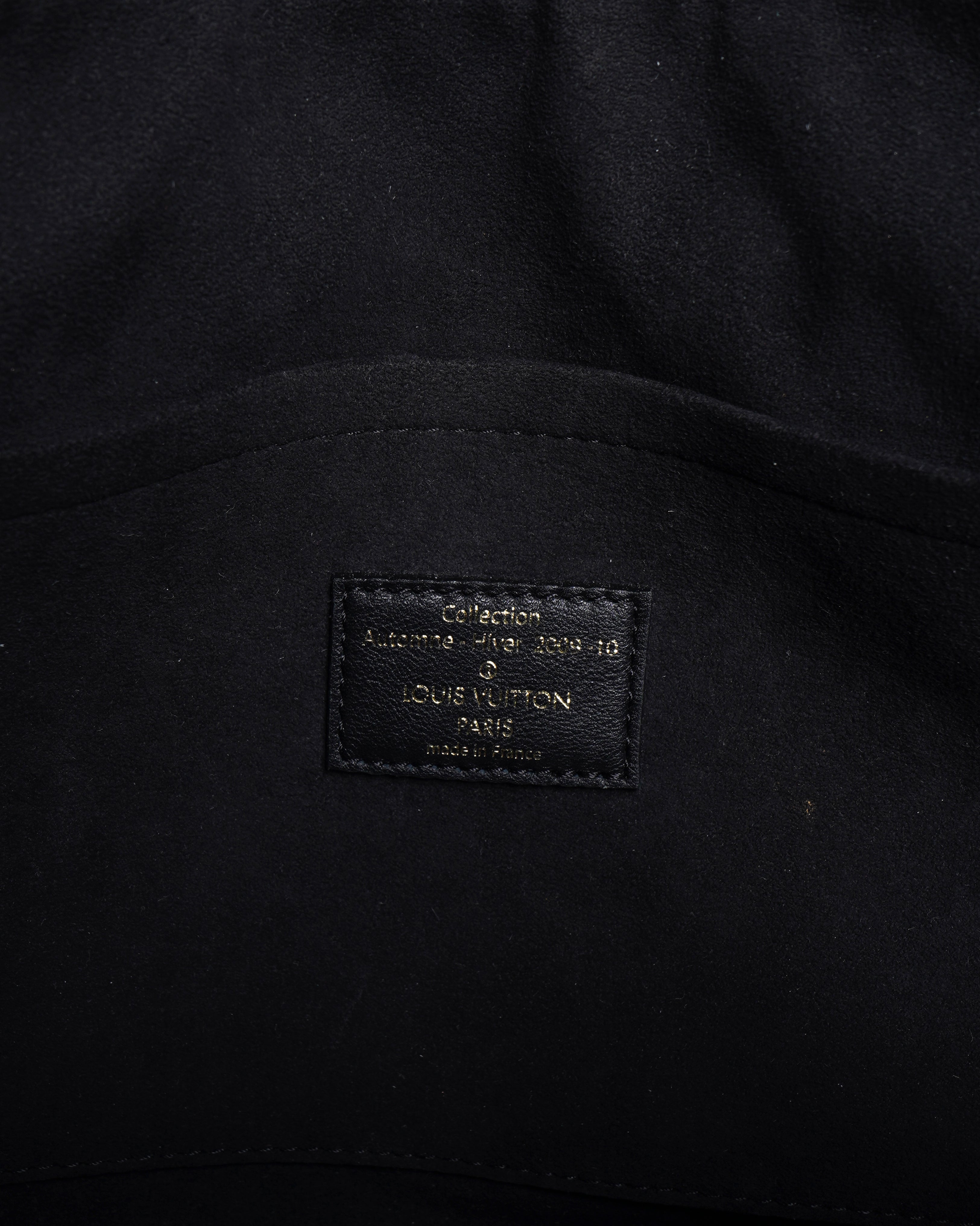 Louis Vuitton
Limited Edition Amber Monogram Eclipse Alma Bag