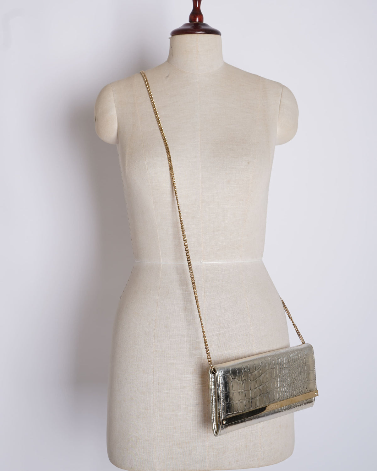 Jimmy Choo Gold Tone Clutch with shoulder chain