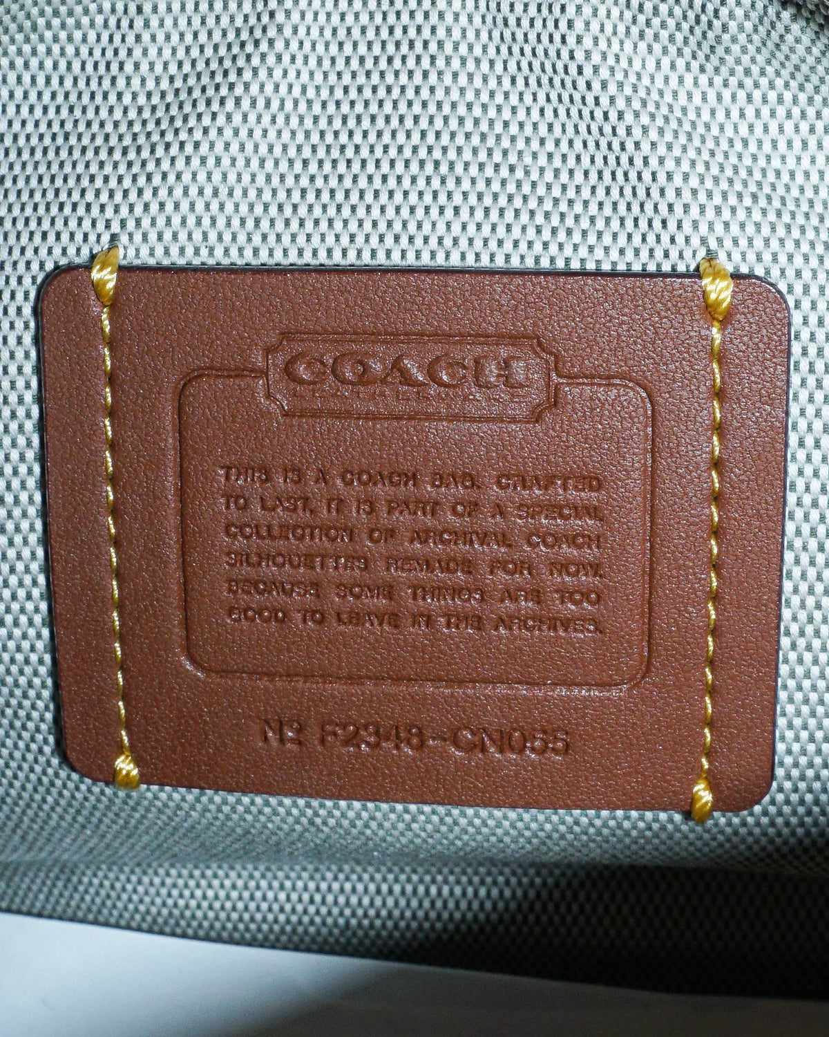 Coach Swinger Shoulder Bag in Signature Debossed Leather