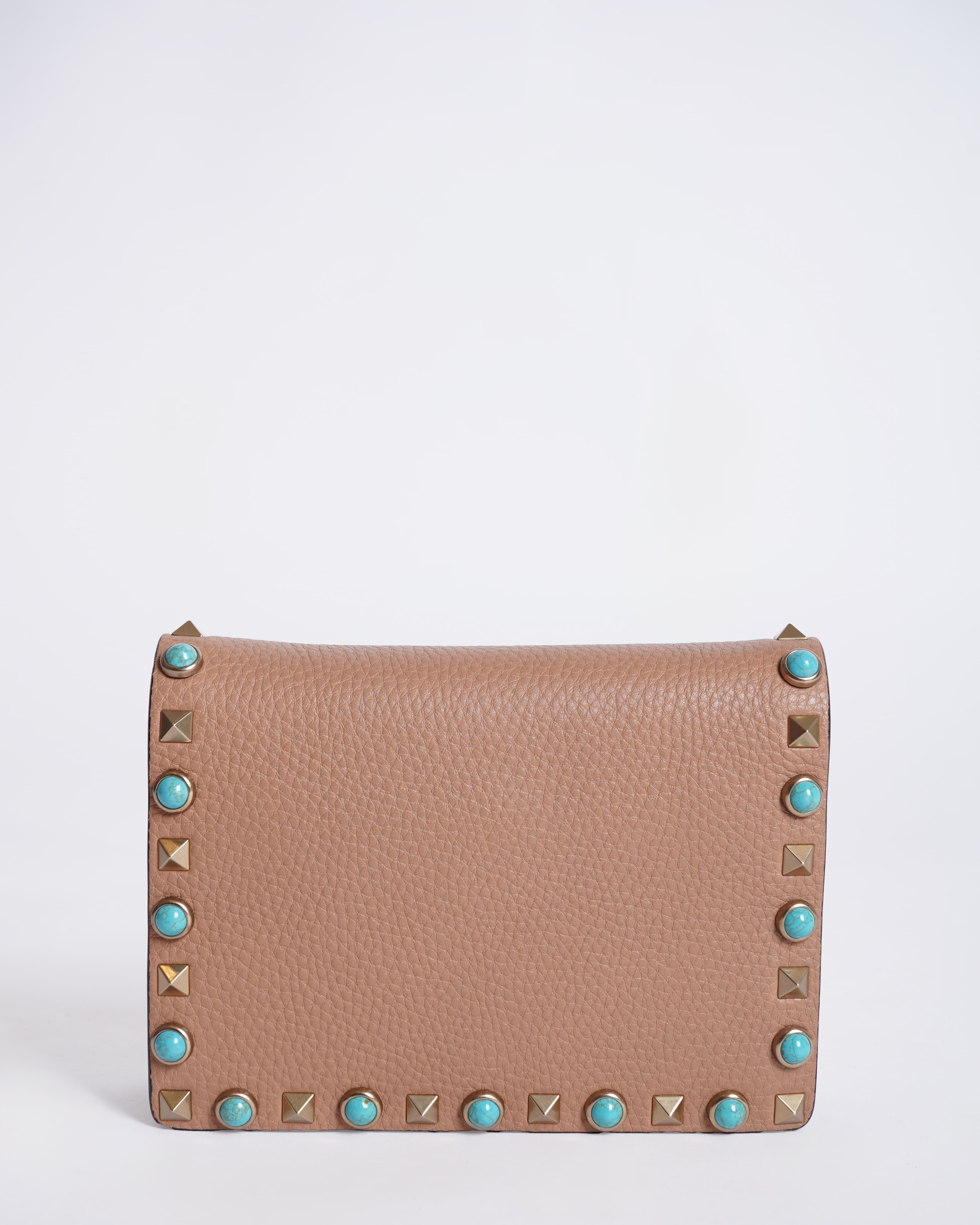 Valentino grained leather rolling rockstud wristlet clutch