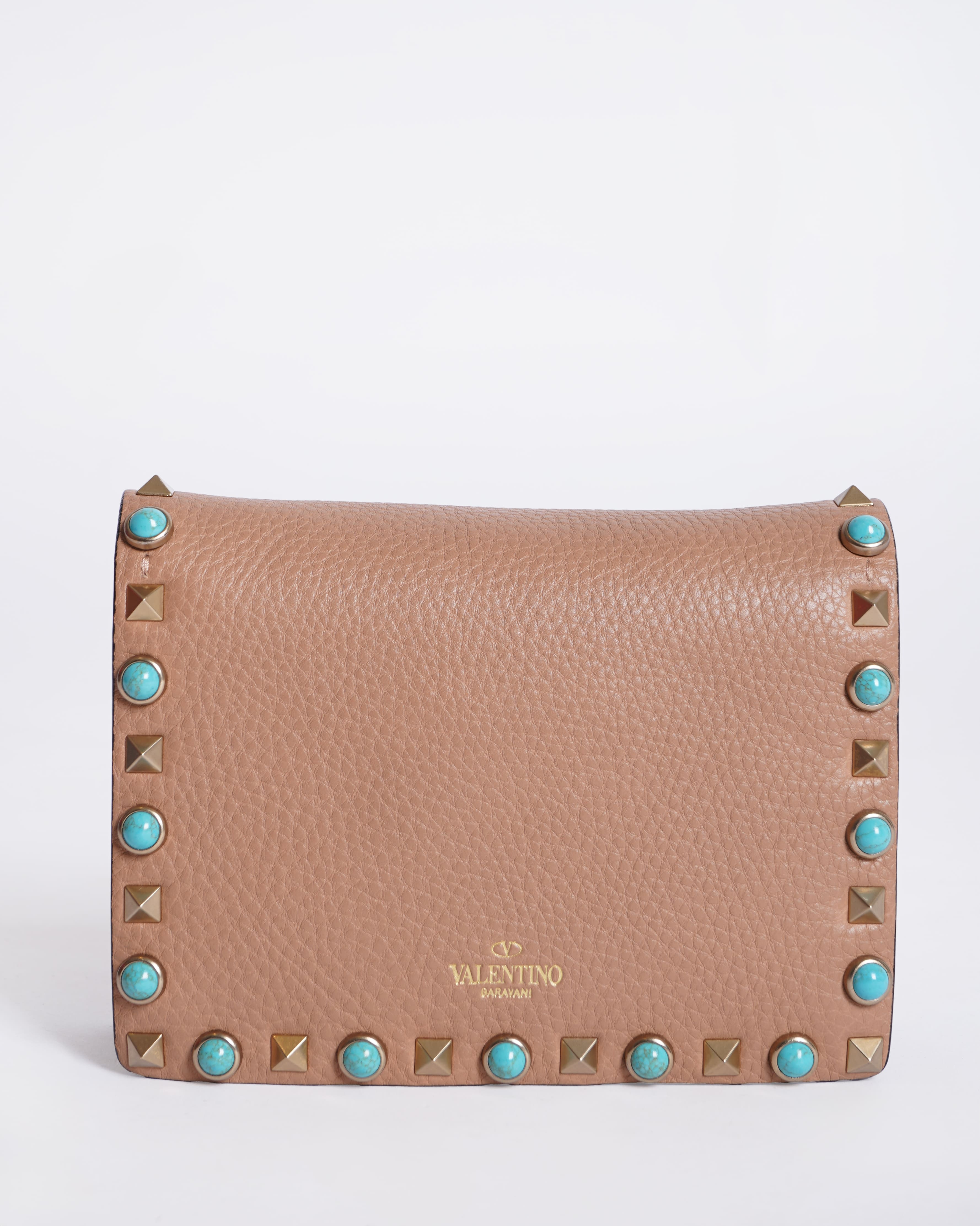 Valentino grained leather rolling rockstud wristlet clutch