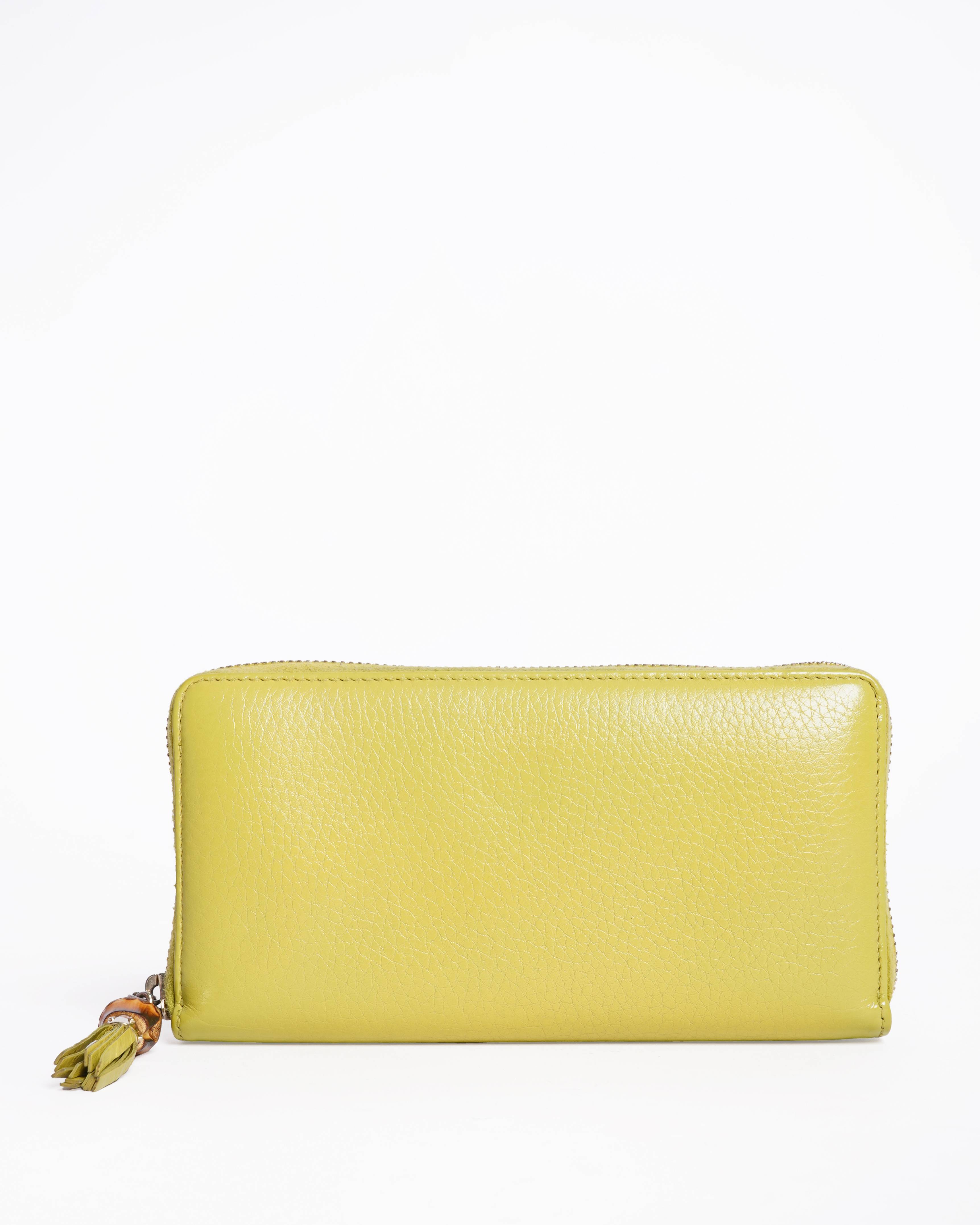 Gucci Leather Zippy Wallet in Yellow