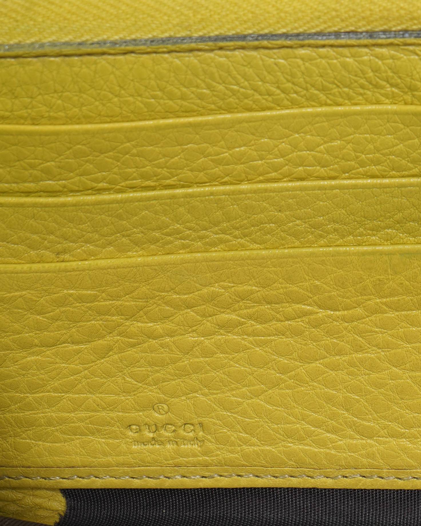 Gucci Leather Zippy Wallet in Yellow