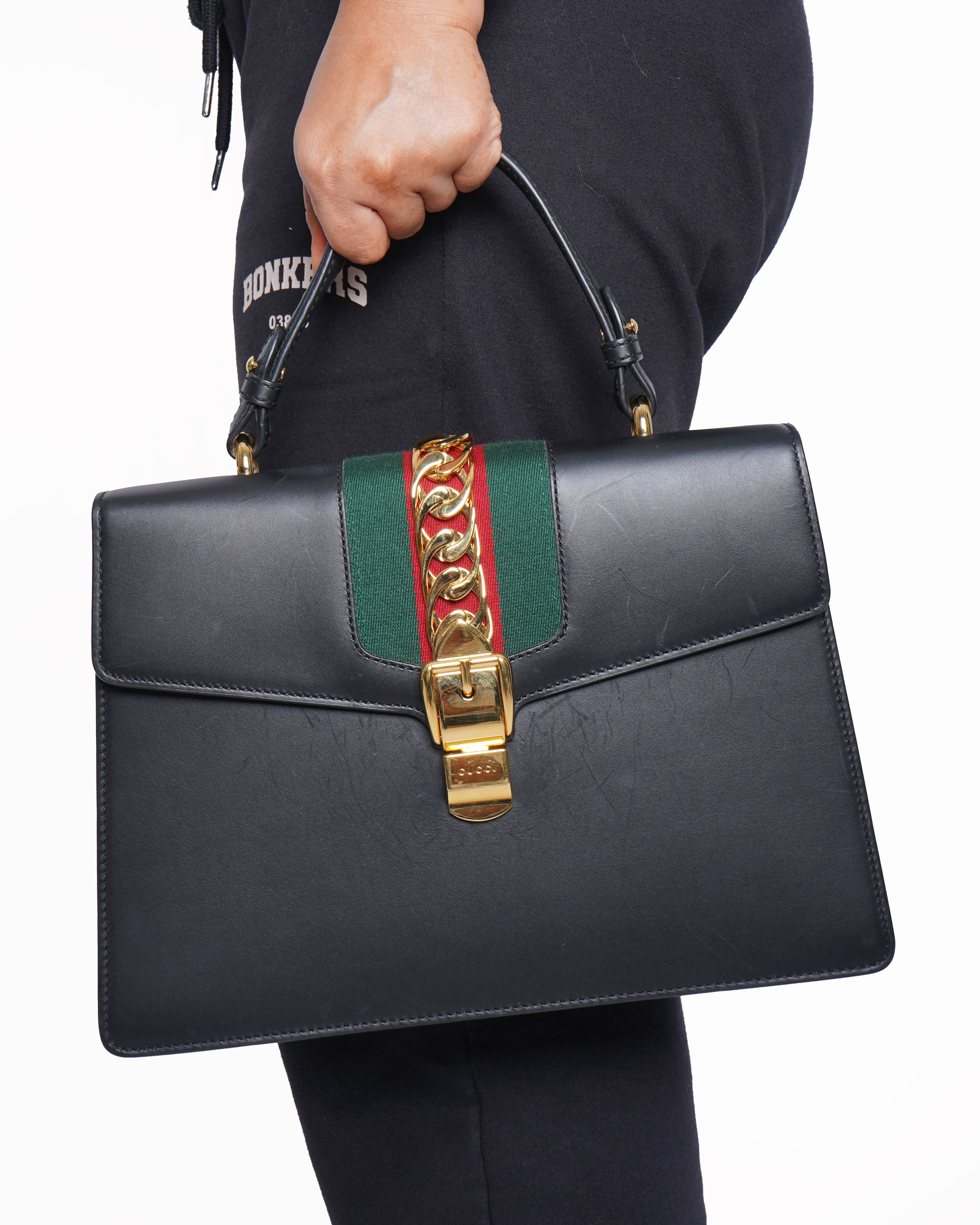 Gucci sylvie black leather handbag