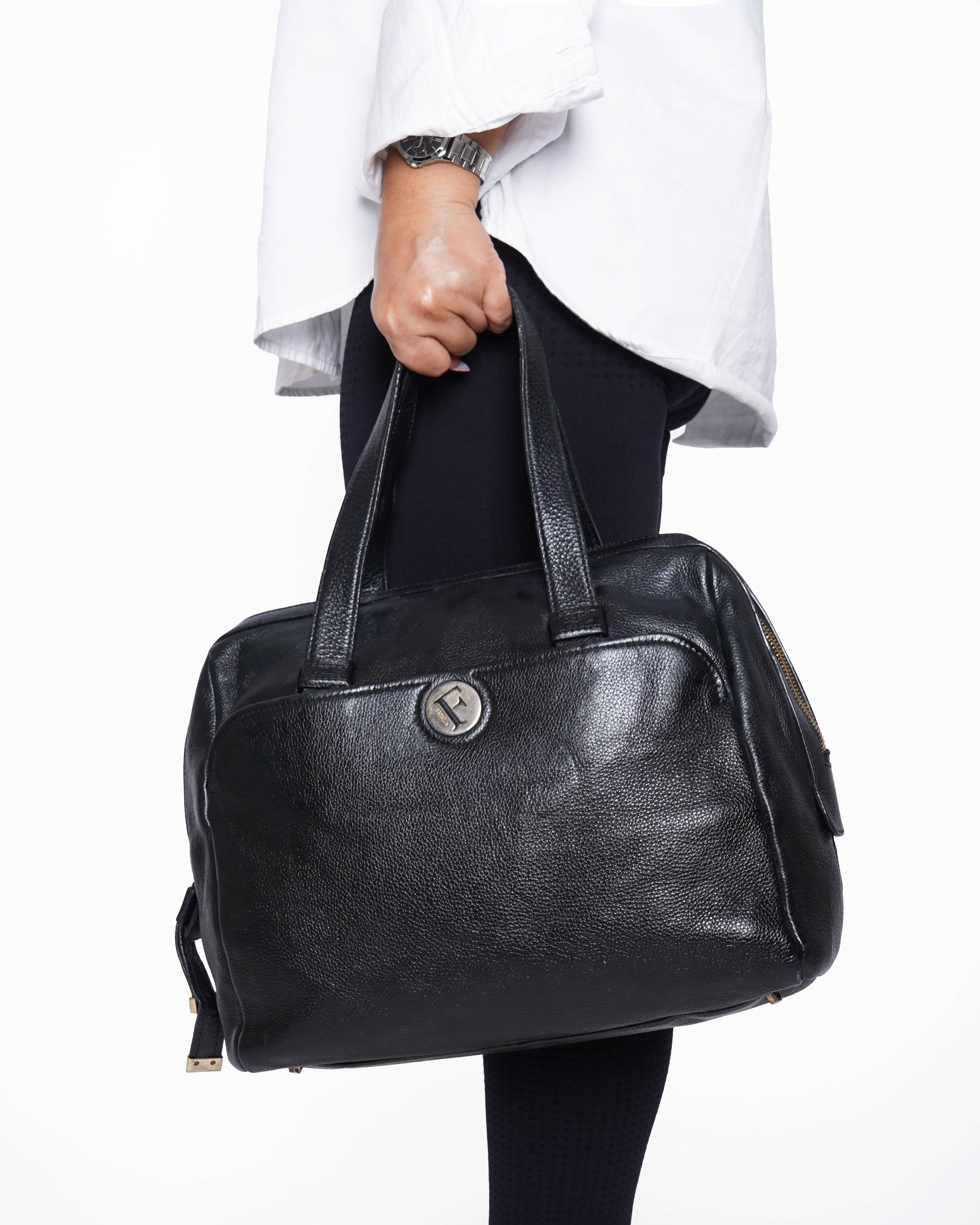 Furla 
black Grained leather hand bag