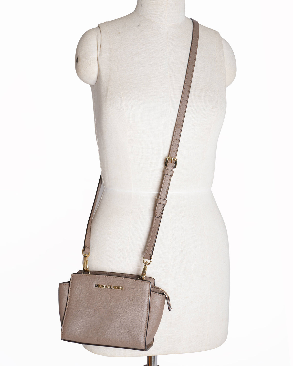Michael kors 
Leather Mini Selma Crossbody bag