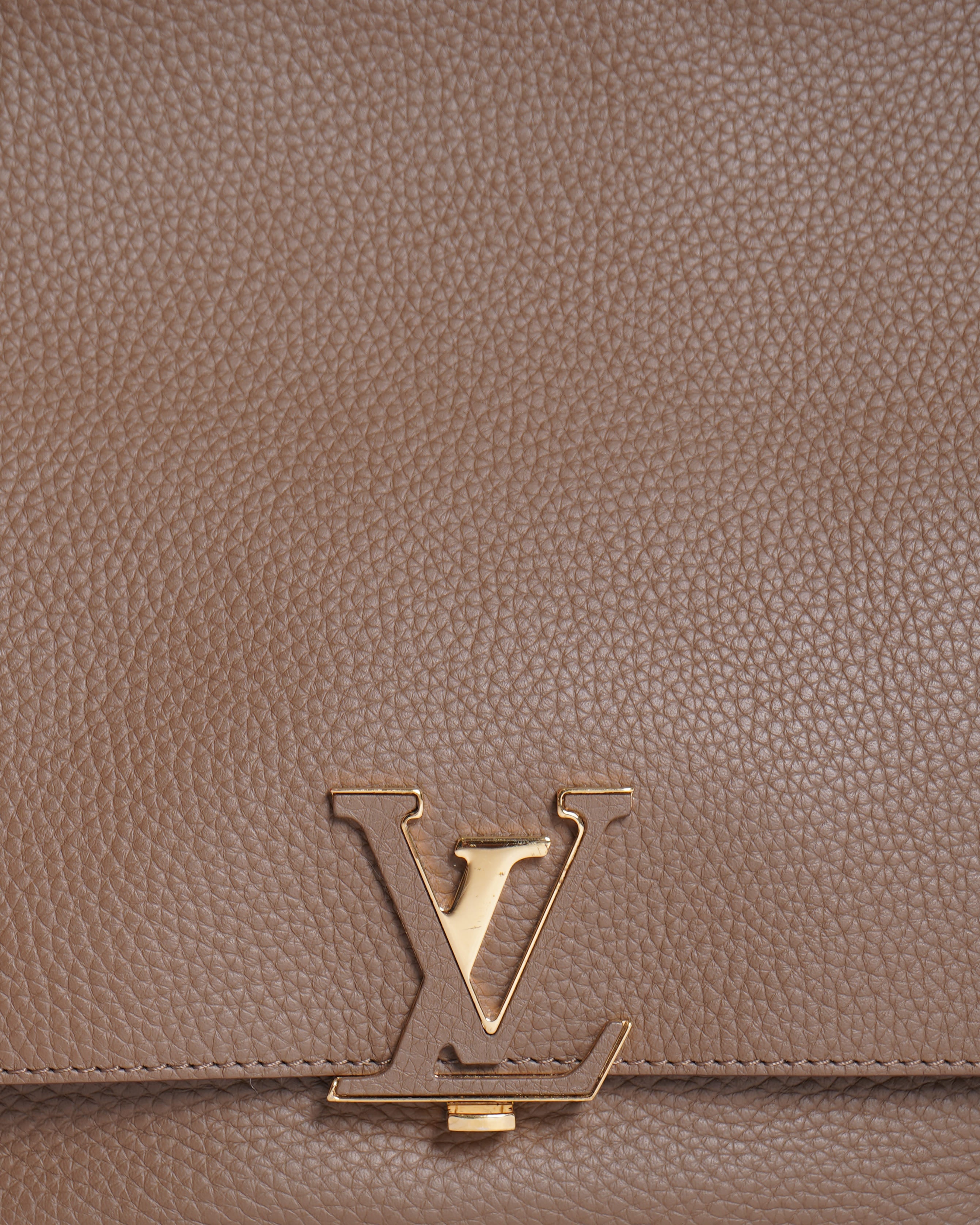 Louis Vuitton Volta Top Handle Bag In Beige