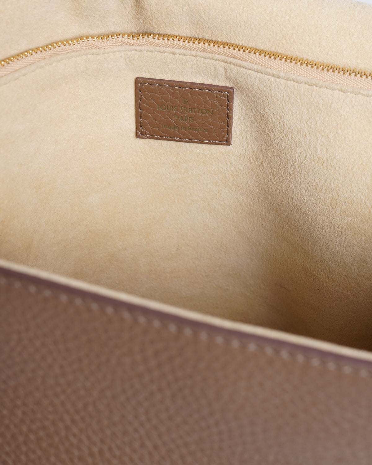 Louis Vuitton Volta Top Handle Bag In Beige