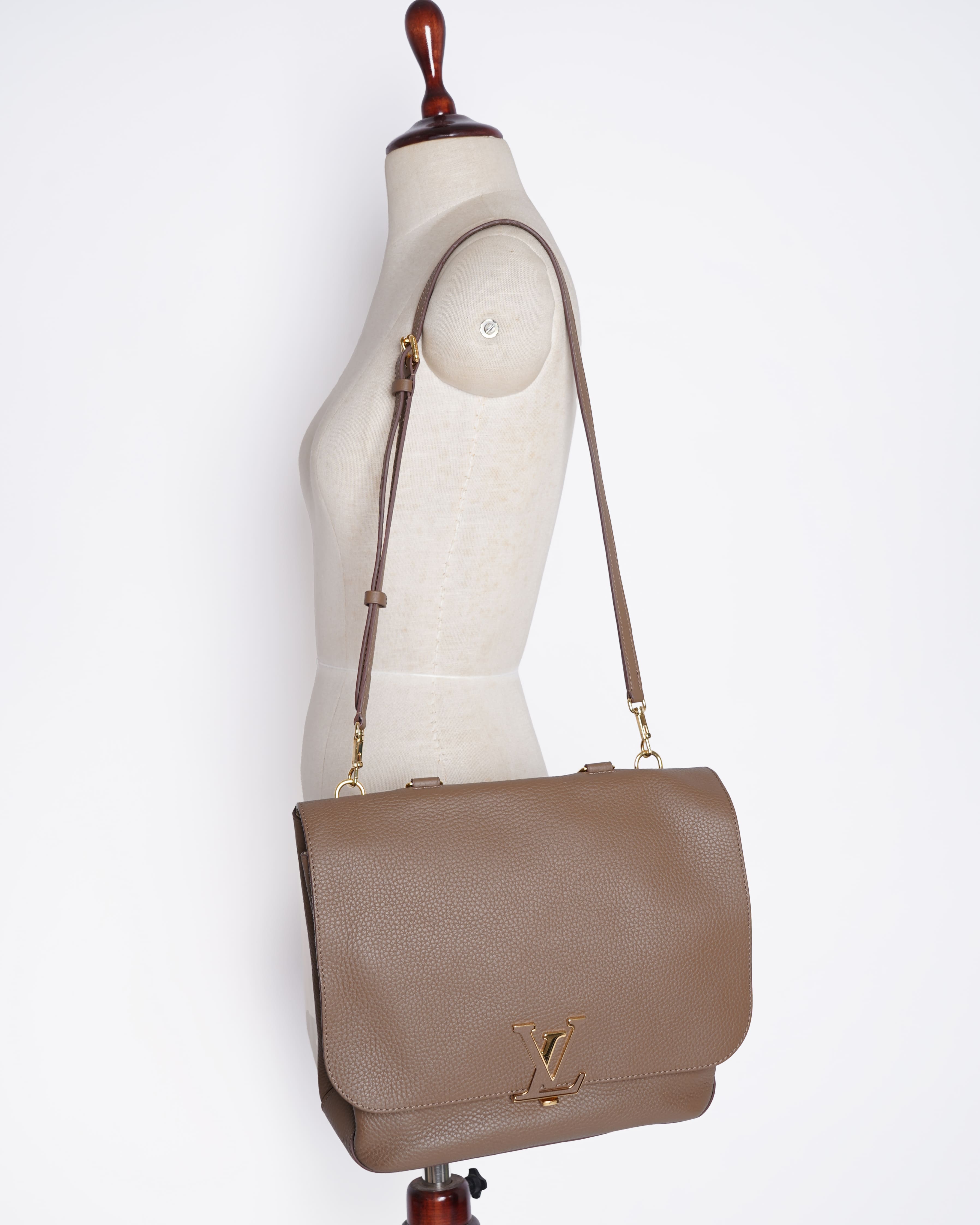 Louis Vuitton Volta Top Handle Bag In Beige