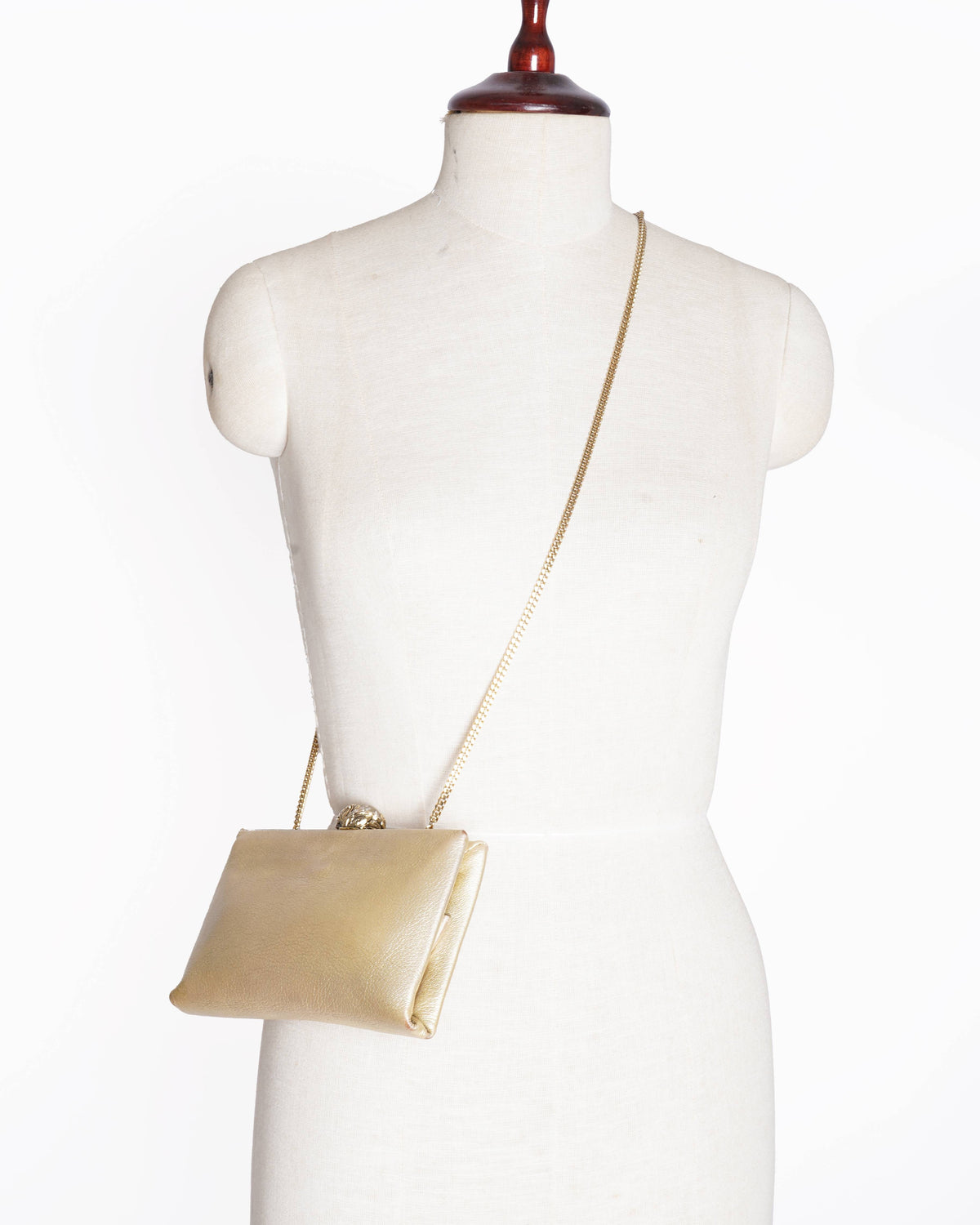 Roberto Cavalli golden chain clutch bag