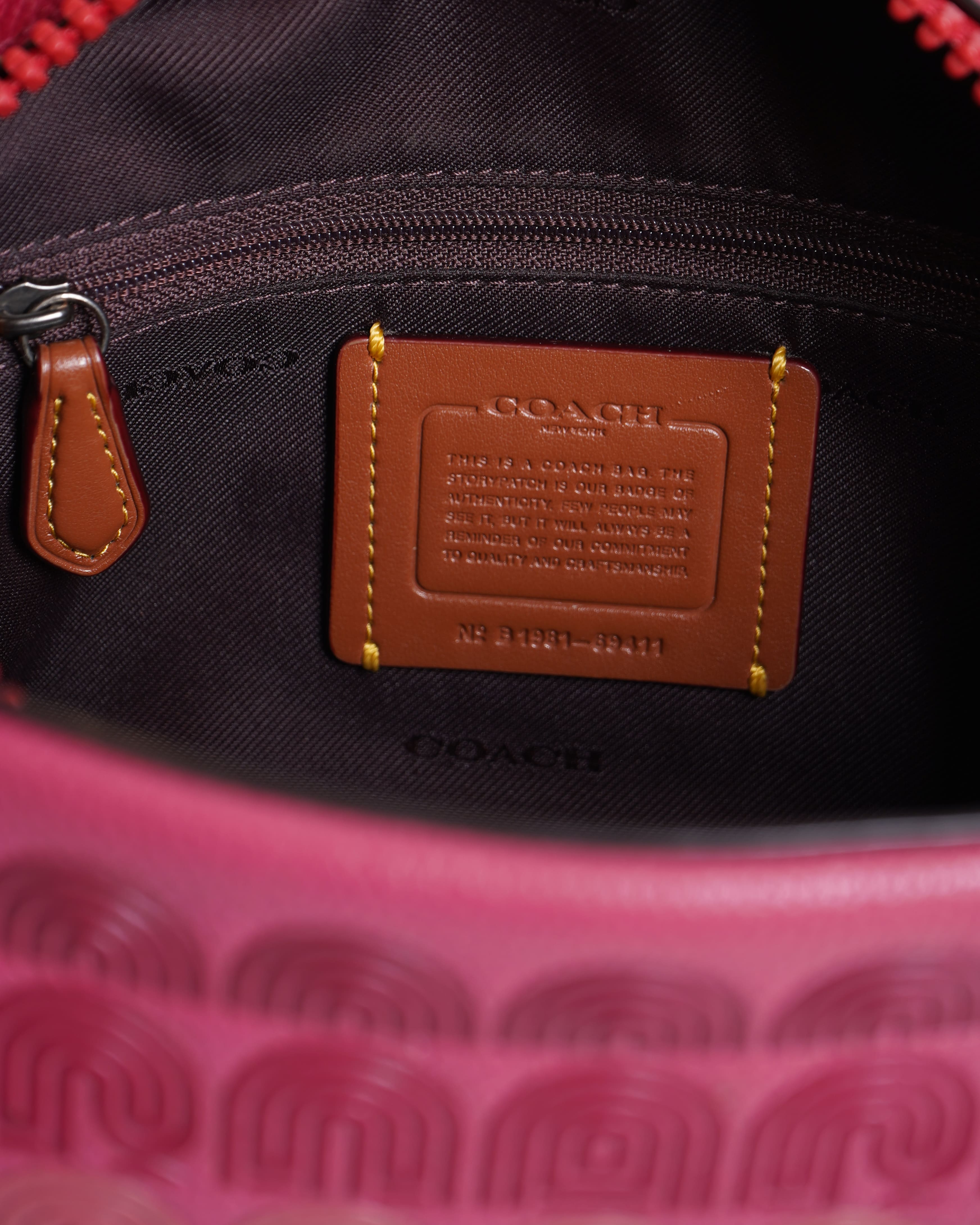 Coach Camera bag with coach print in Pink