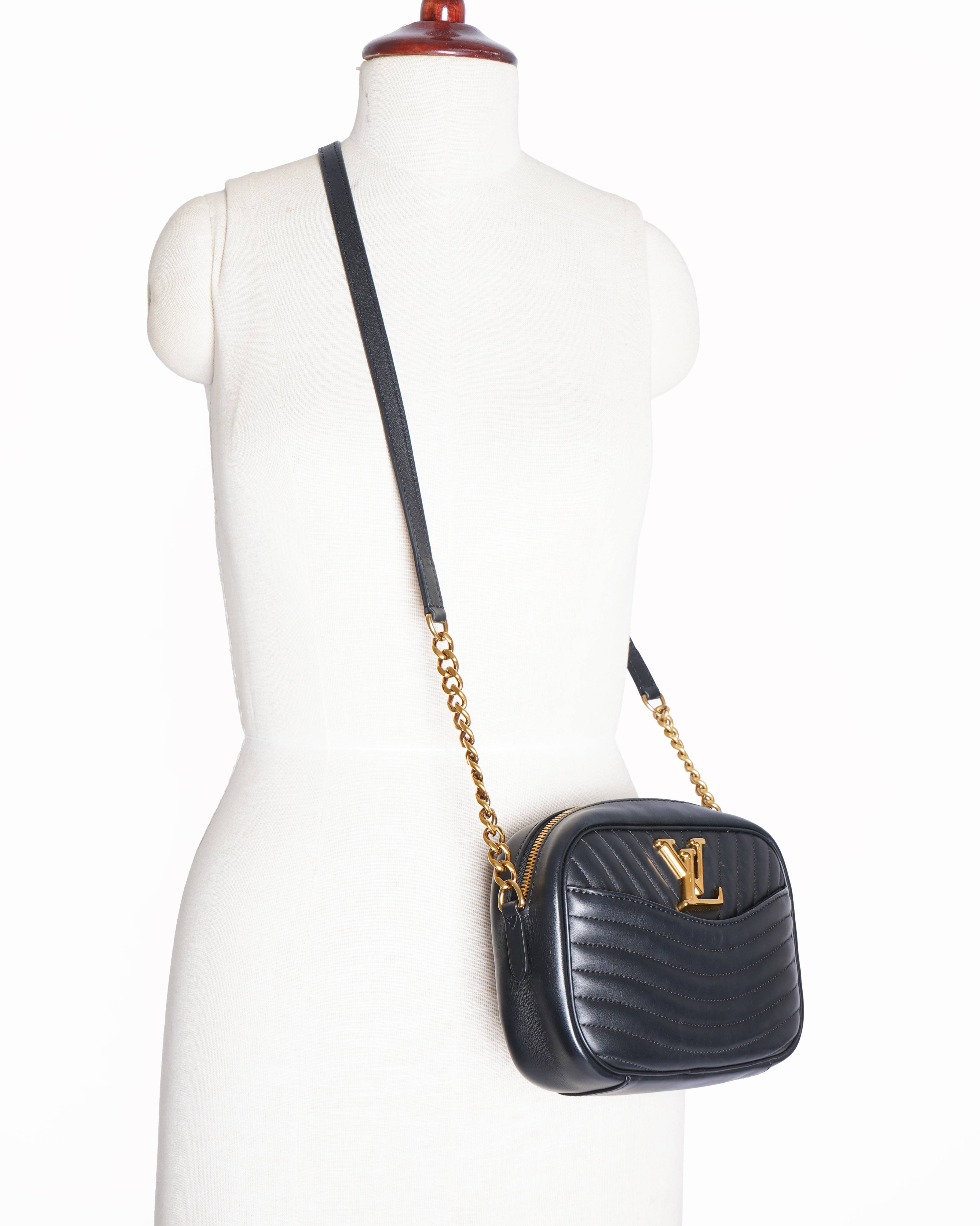 Louis Vuitton calfskin wave camera bag in black