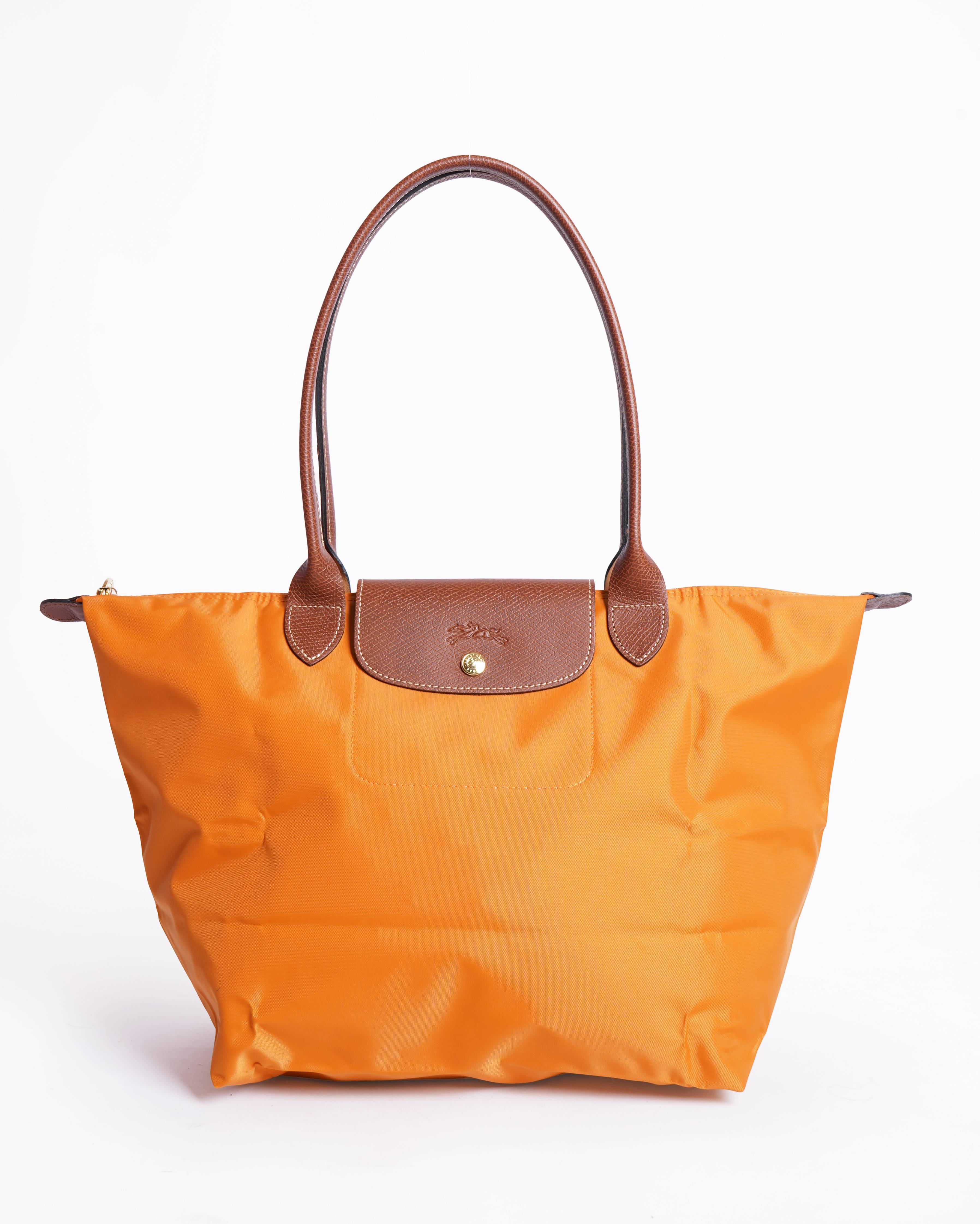 New Longchamp le pliage tote bag in orange