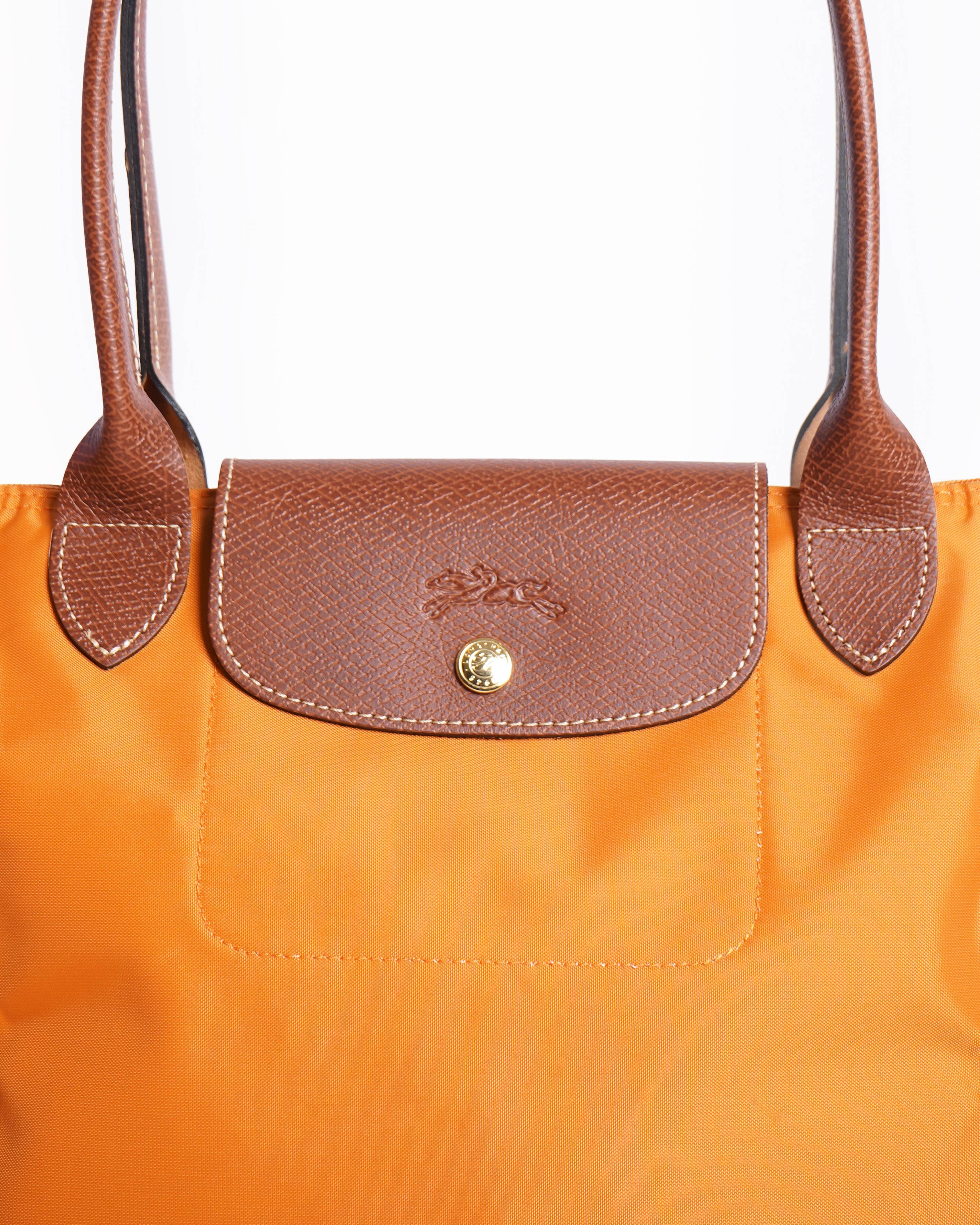 New Longchamp le pliage tote bag in orange