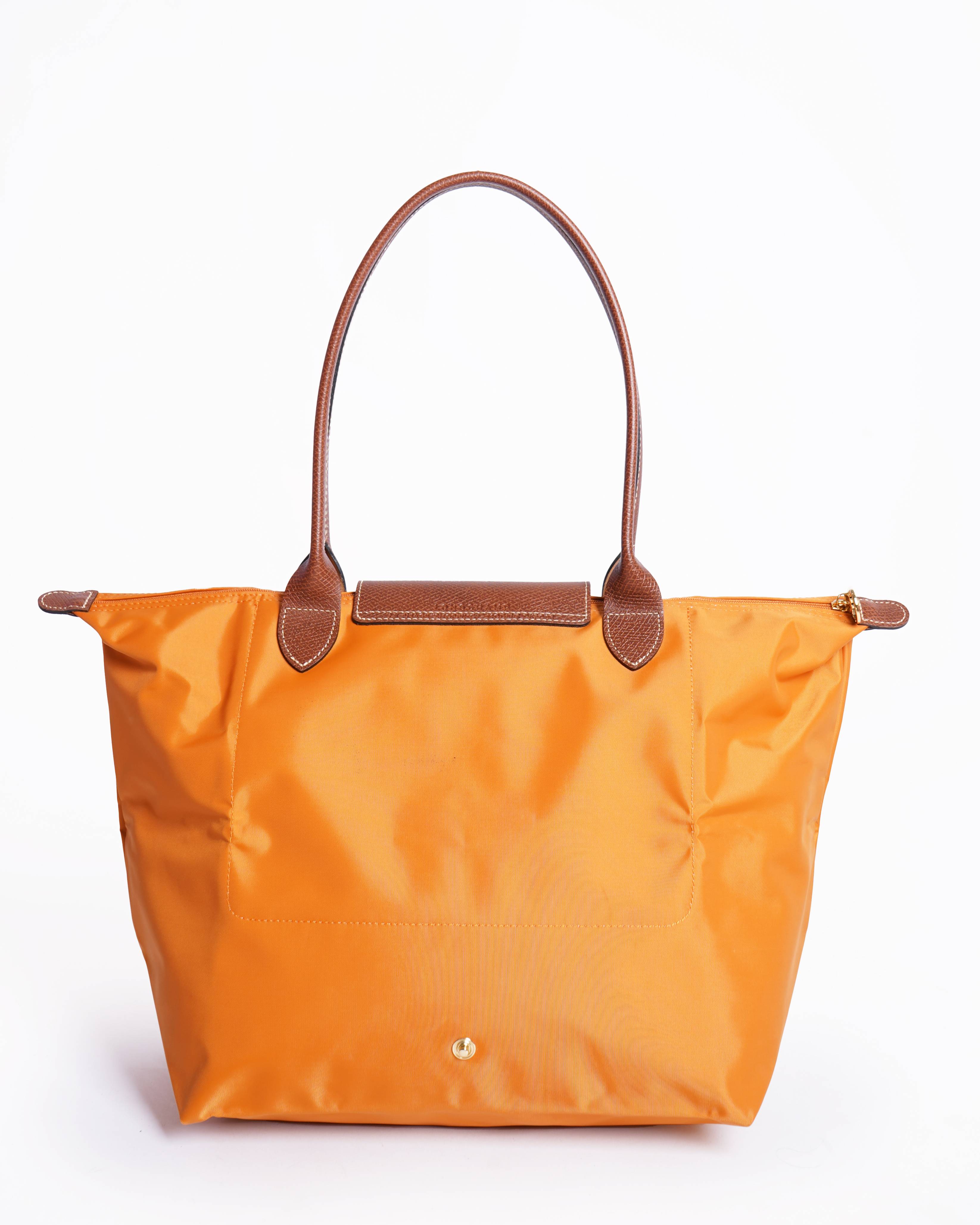 New Longchamp le pliage tote bag in orange