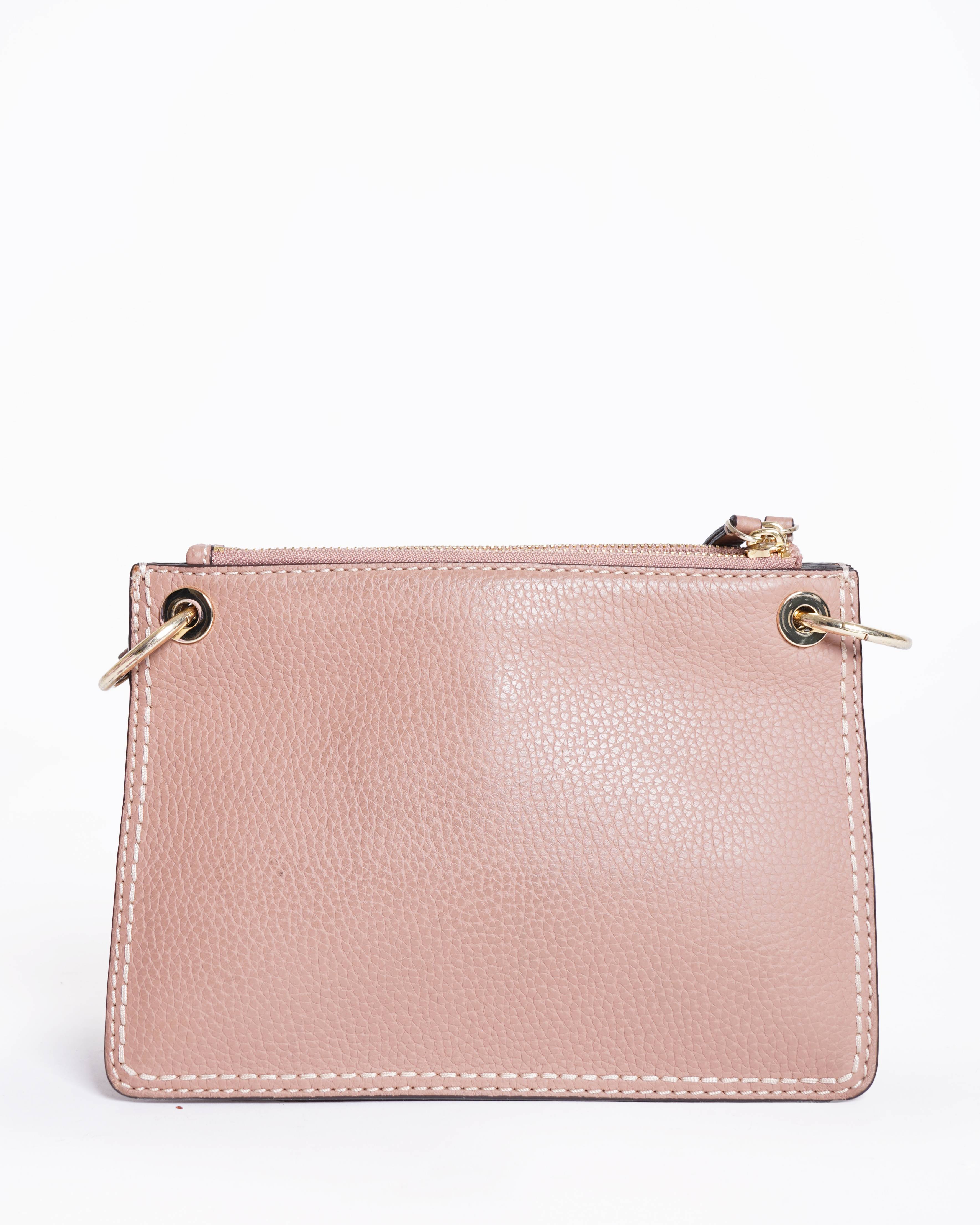 Kate Spade 
Dusky pink Crossbody bag