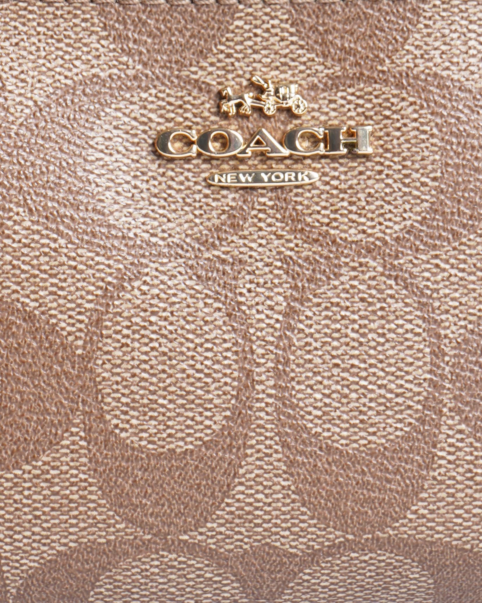 Coach monogram signature brown wristlet