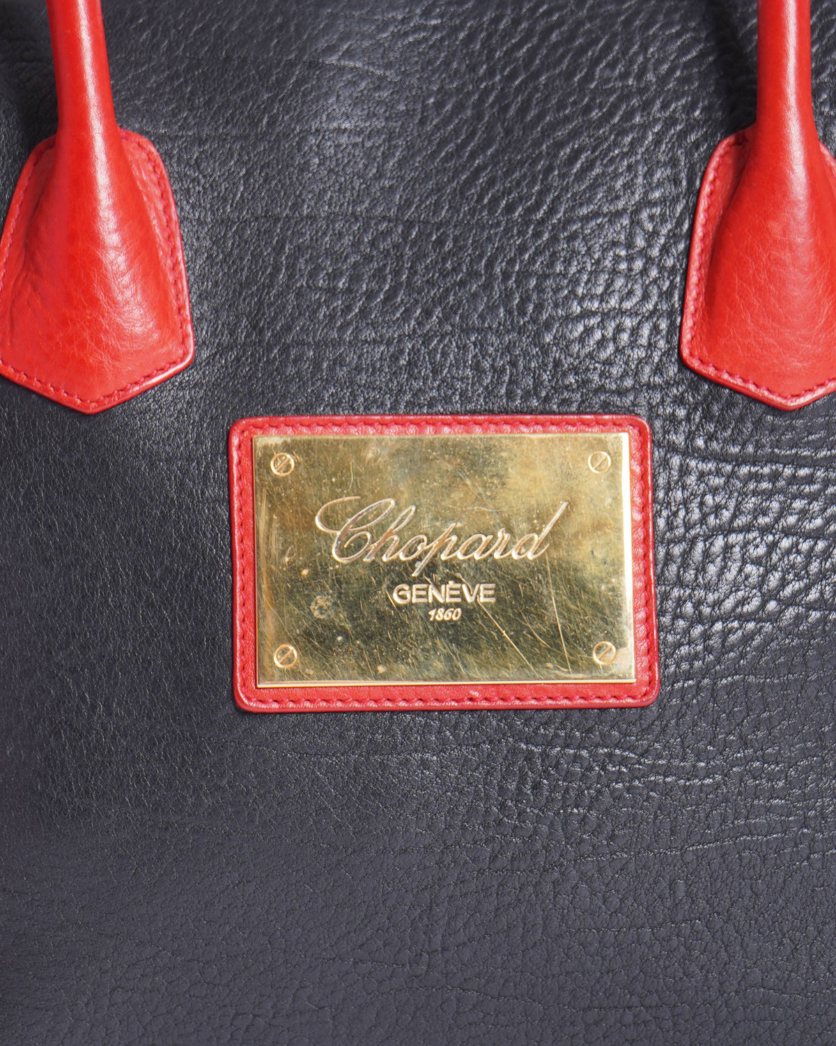 Chopard Genève black and red leather handbag