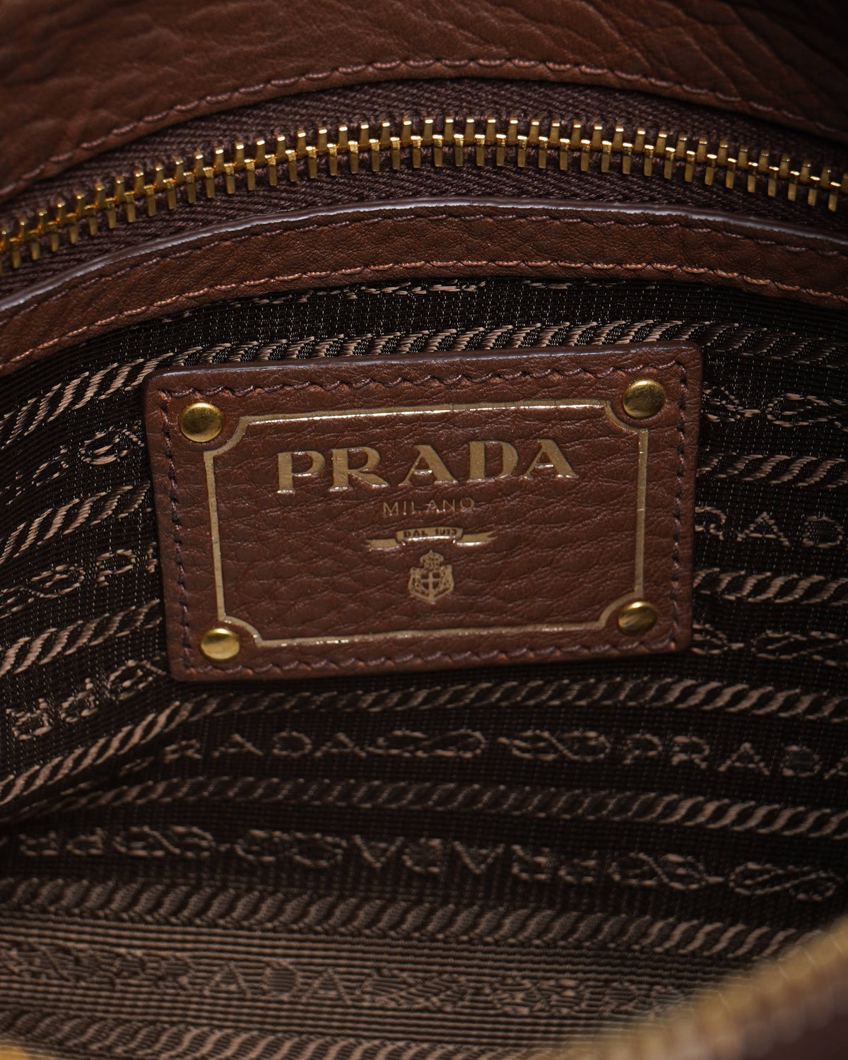 Prada 
Vitello Daino Leather Small Shoulder Bag