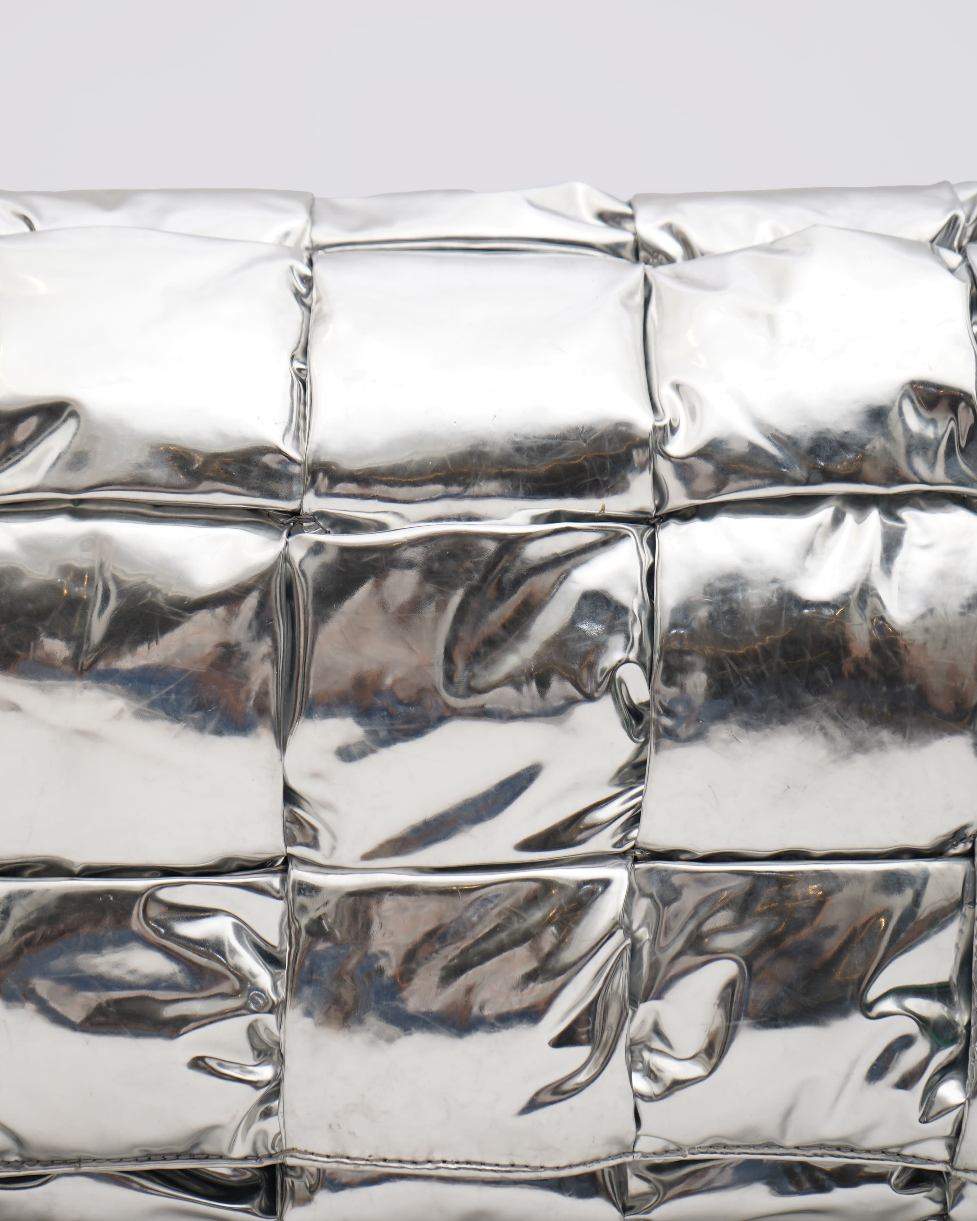 Bottega Veneta Intrecciato Padded Cassette In Silver
