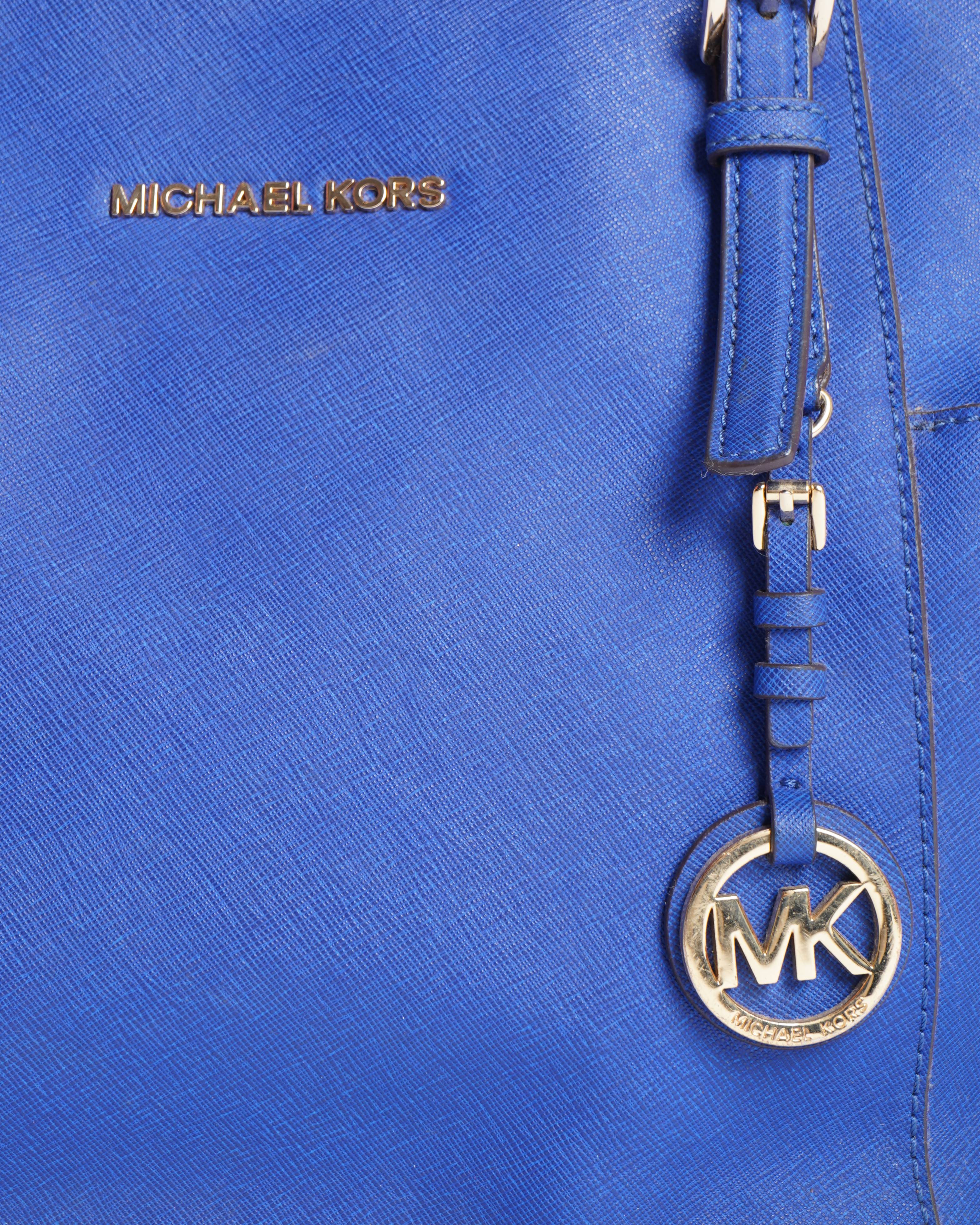 Michael Kors 
Electric blue handbag