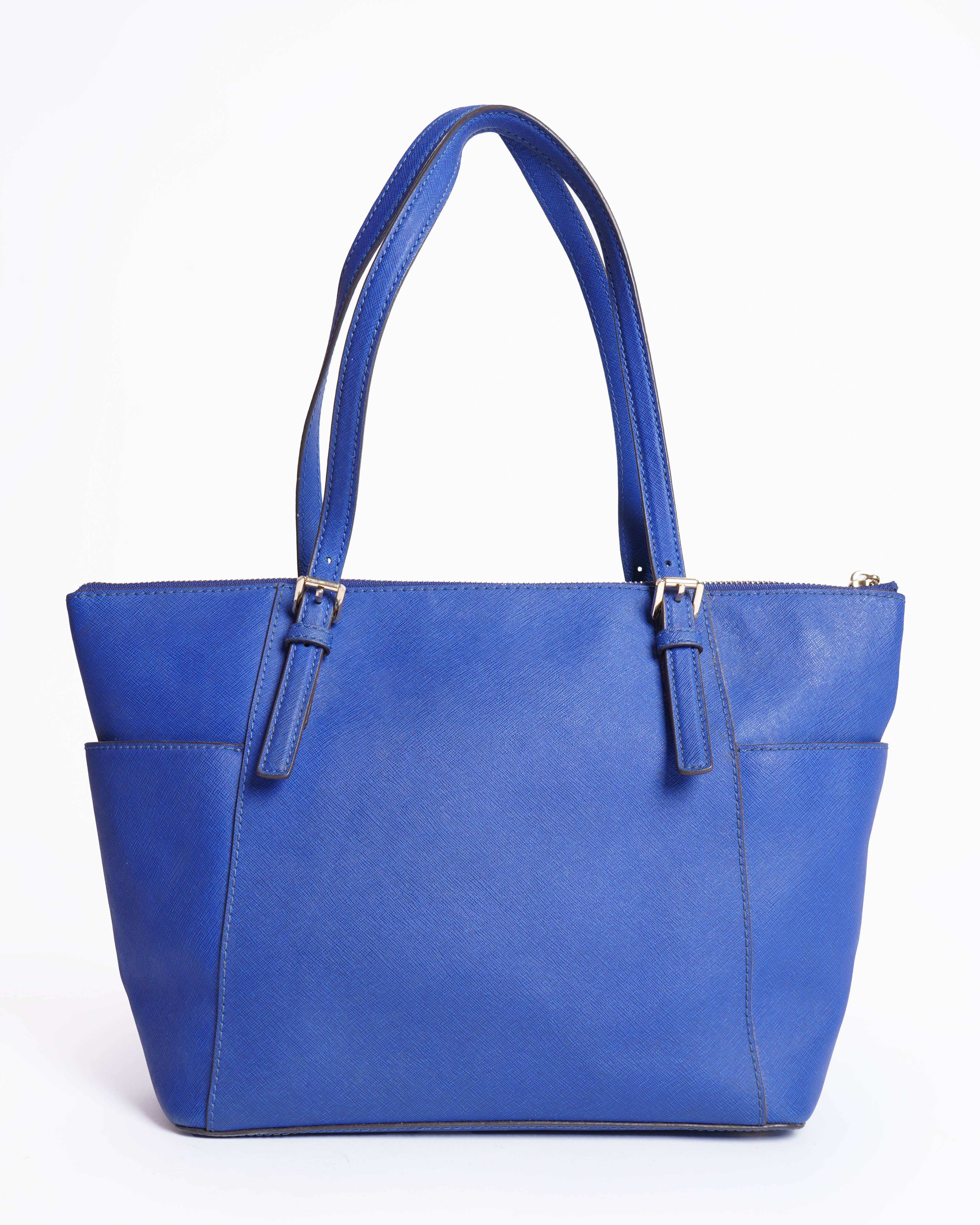 Michael Kors 
Electric blue handbag