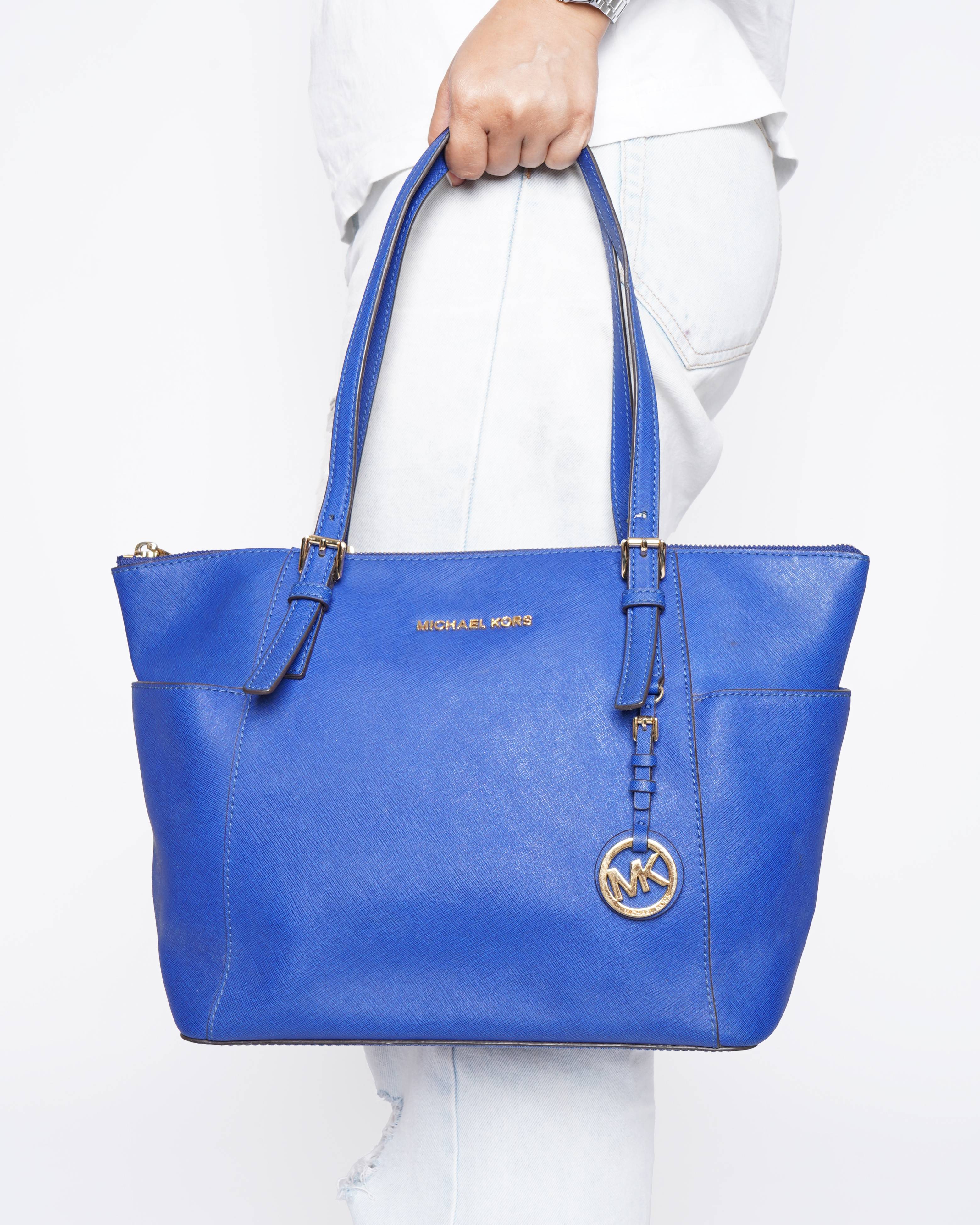 Michael Kors 
Electric blue handbag