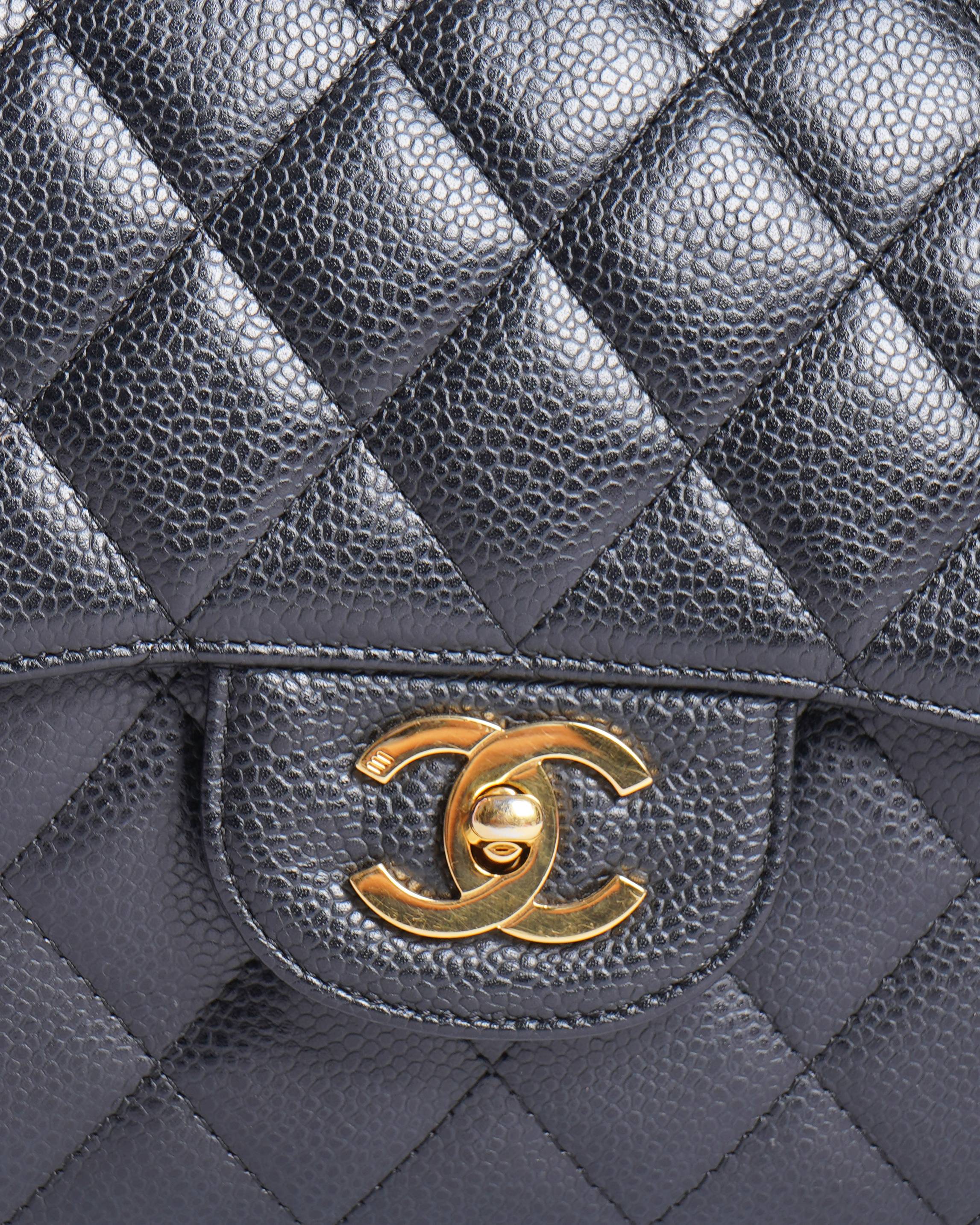 Chanel maxi classic flap in grained calfskin and gold hardware Shoulder Bag