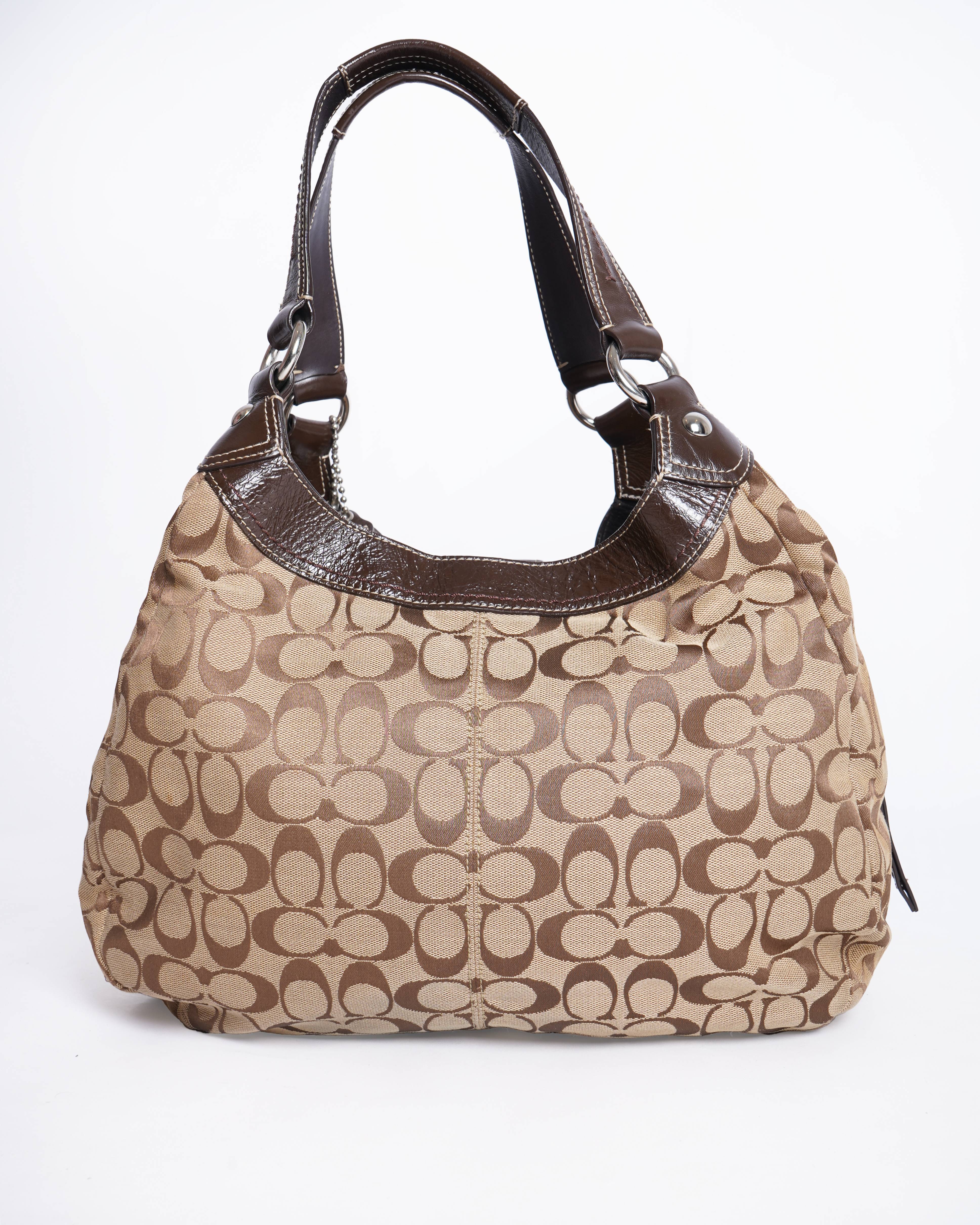 Coach Soho Lynn Hobo bag in a brown signature jacquard canvas