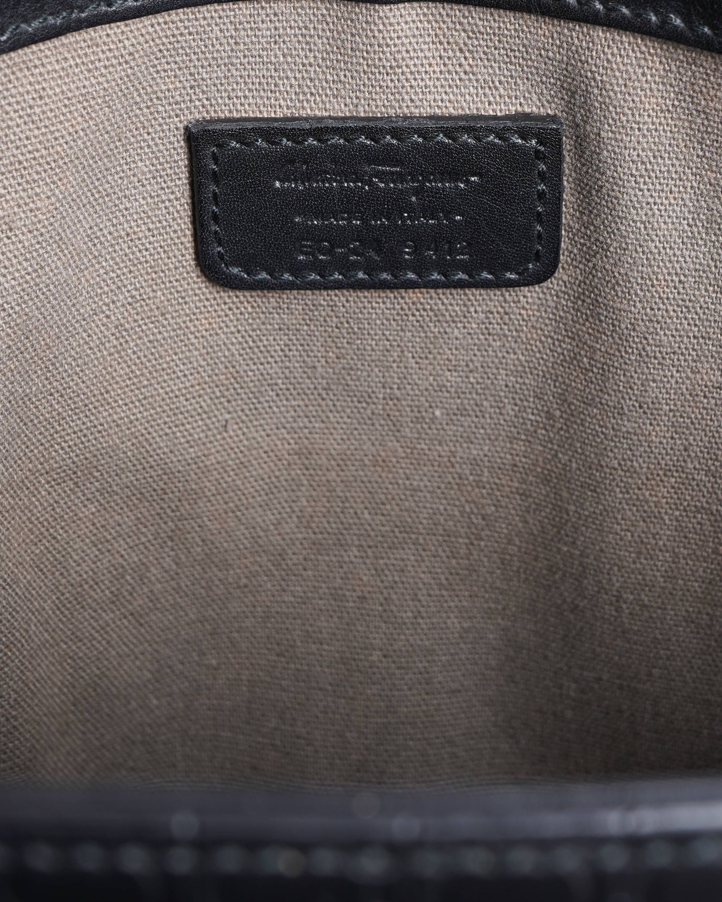 Salvatore Ferragamo Embossed Logo Messenger Bag In Black