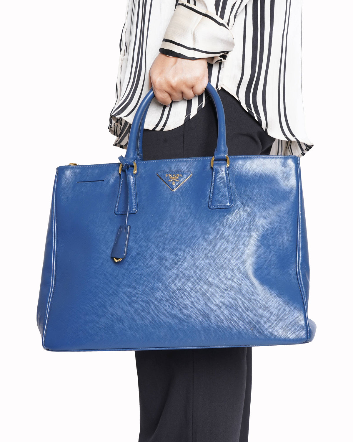 Prada 
blue saffiano leather bauletto satchel in black