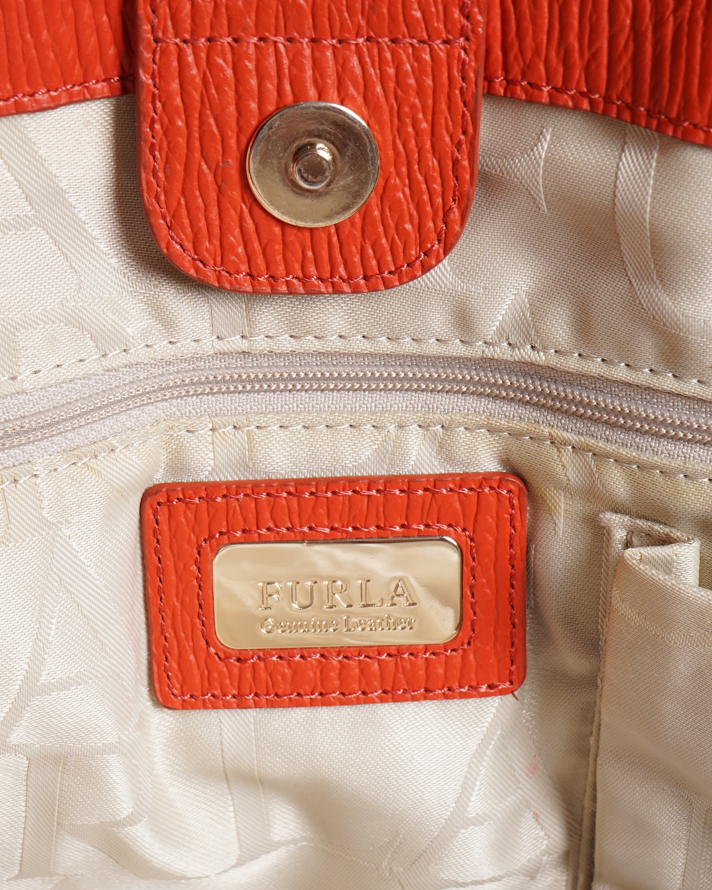 Furla red textured top handle bag