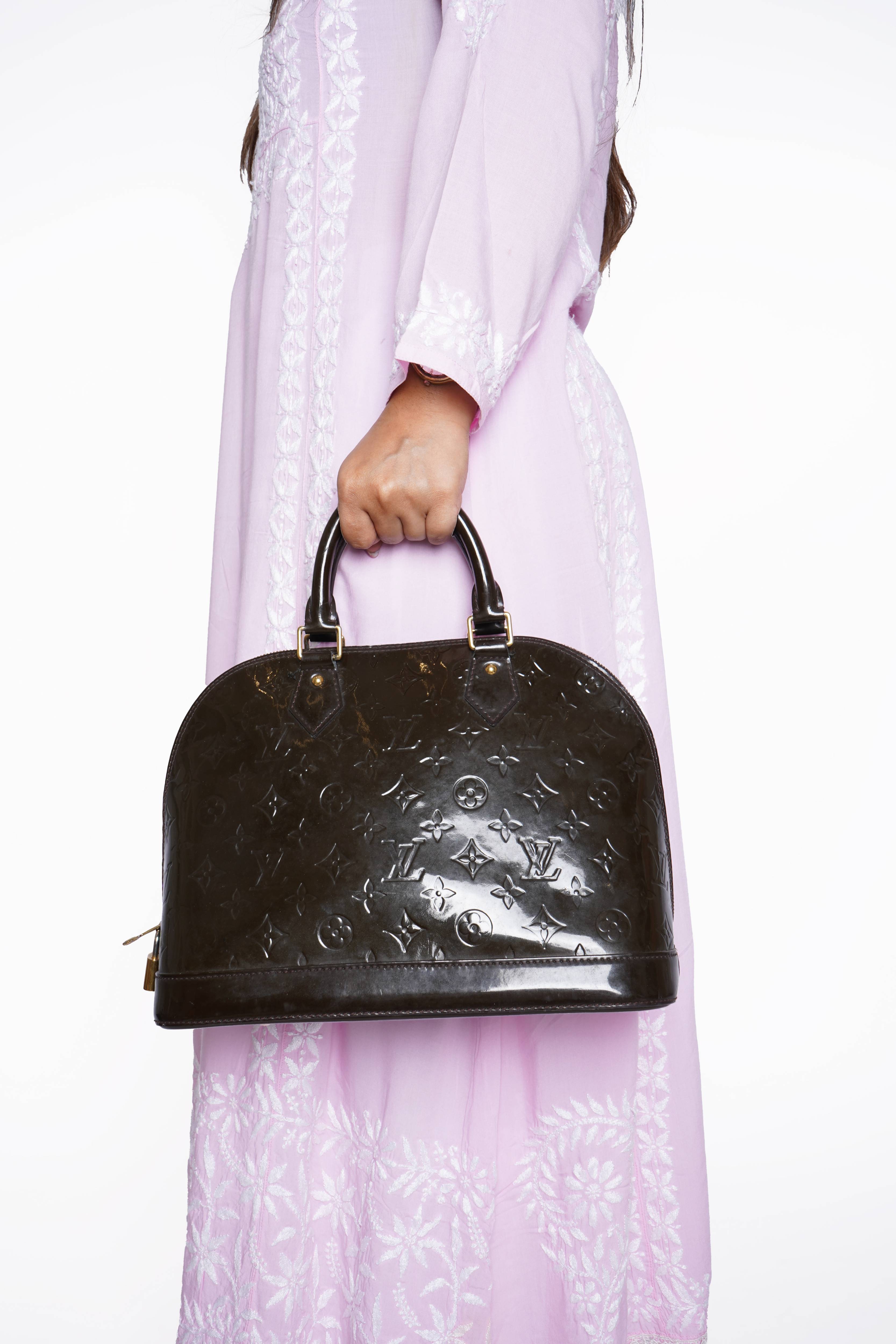 Louis Vuitton GM vernis amarante handbag